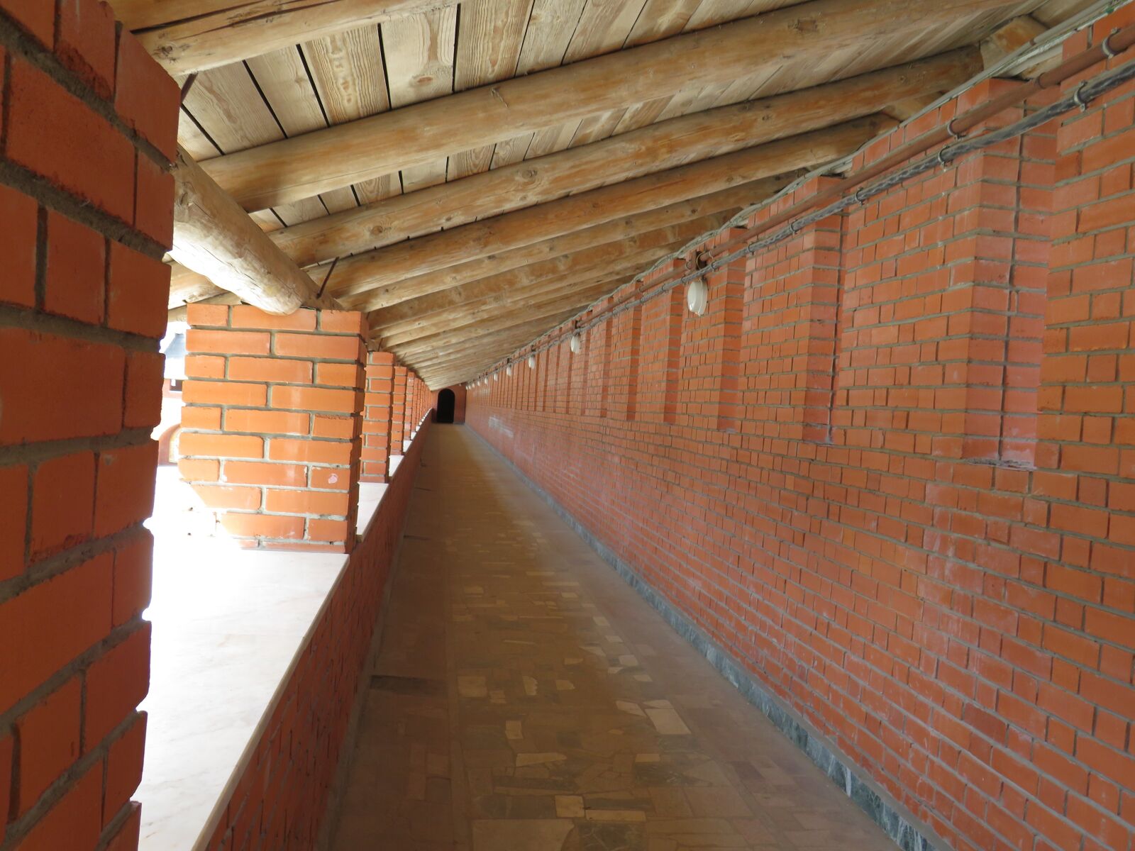 Canon PowerShot SX540 HS sample photo. Brick, tree, tunnel photography