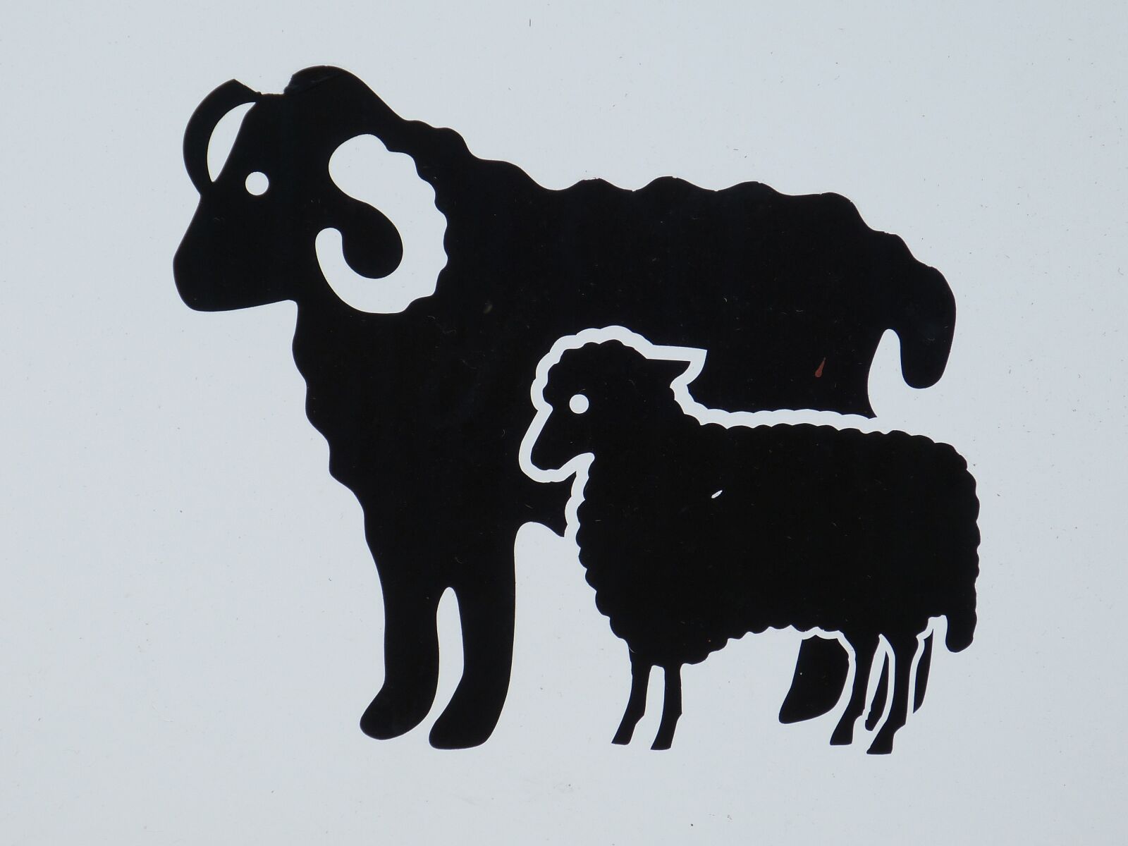 Panasonic Lumix DMC-FZ150 sample photo. Shield, characters, sheep photography