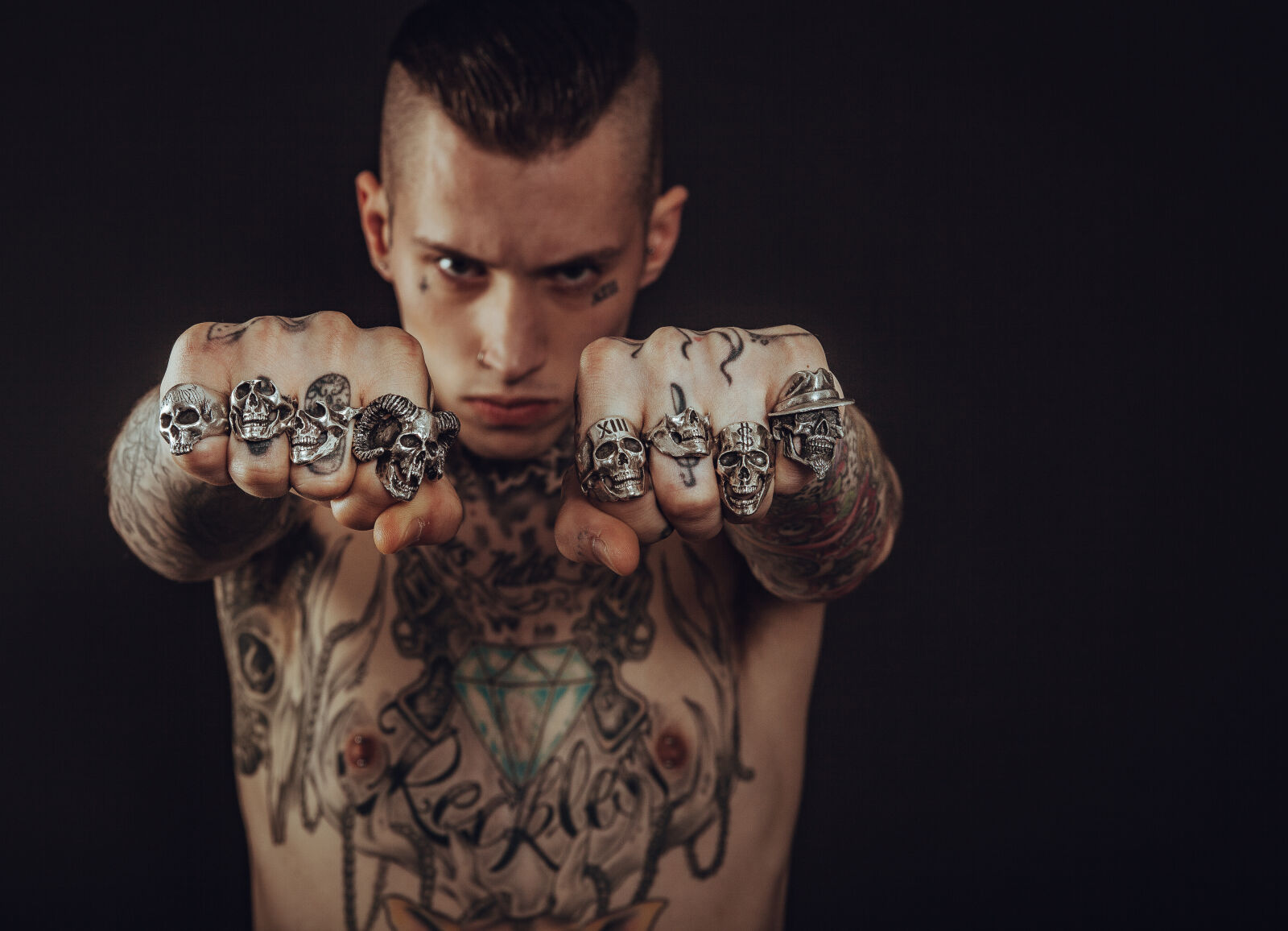 Canon EF 28-70mm f/2.8L USM sample photo. Man, wearing, silver, skull photography