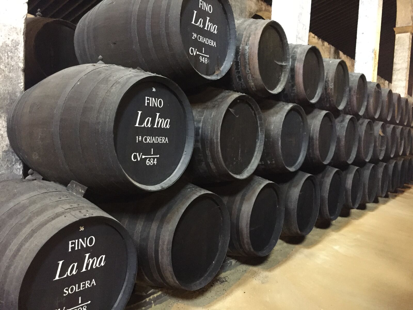 iPhone 6 back camera 4.15mm f/2.2 sample photo. Sherry, barrels, bodega photography