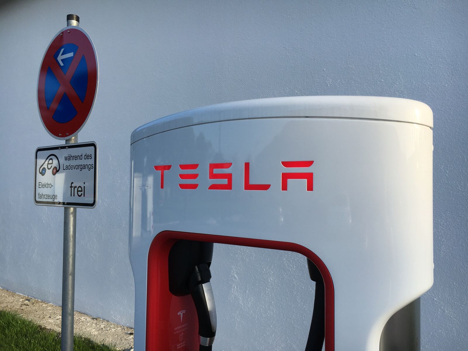 Apple iPhone 6s sample photo. Tesla, charging station, parking photography