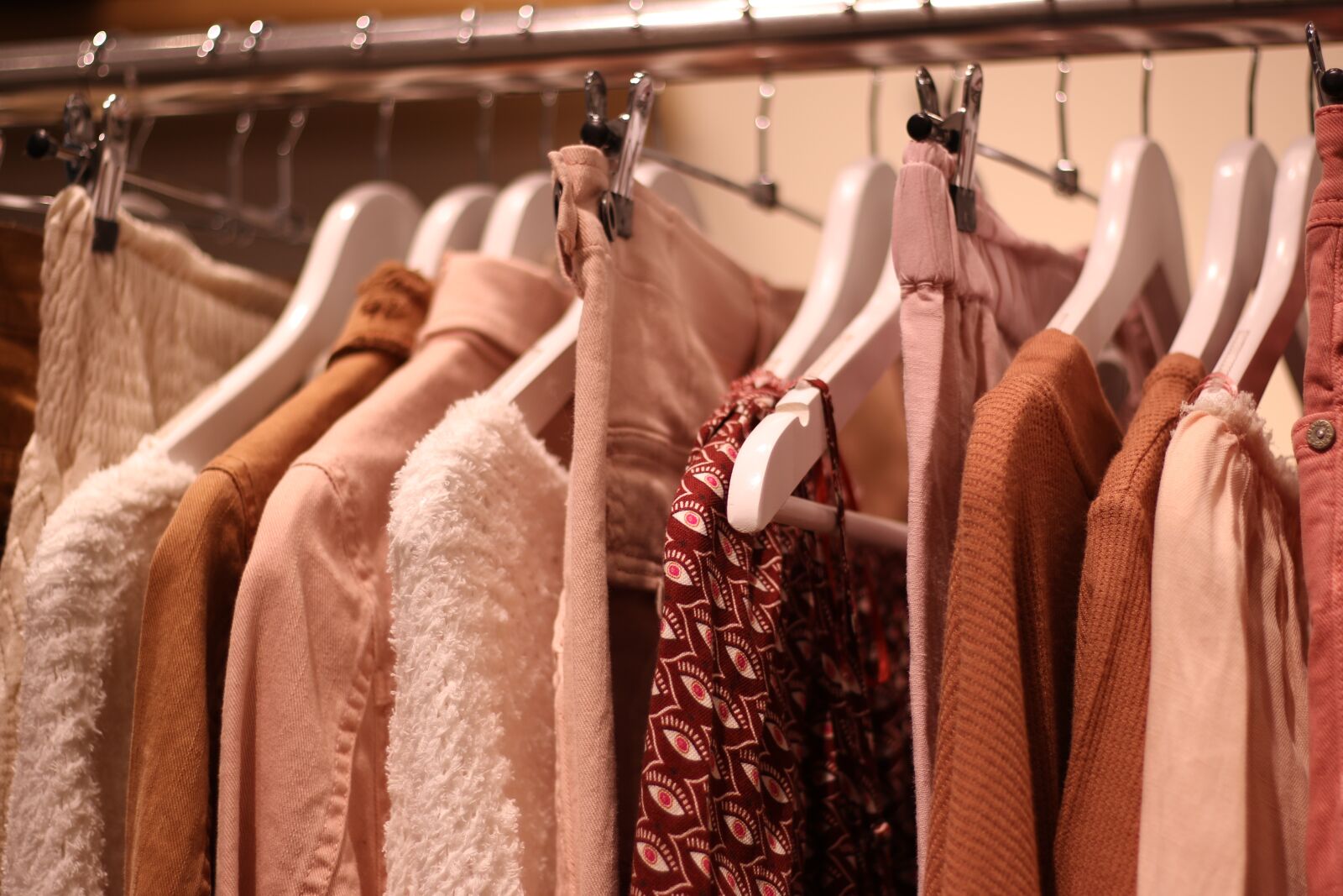 Canon EF 50mm F1.8 STM sample photo. Clothes, hangers, shop photography