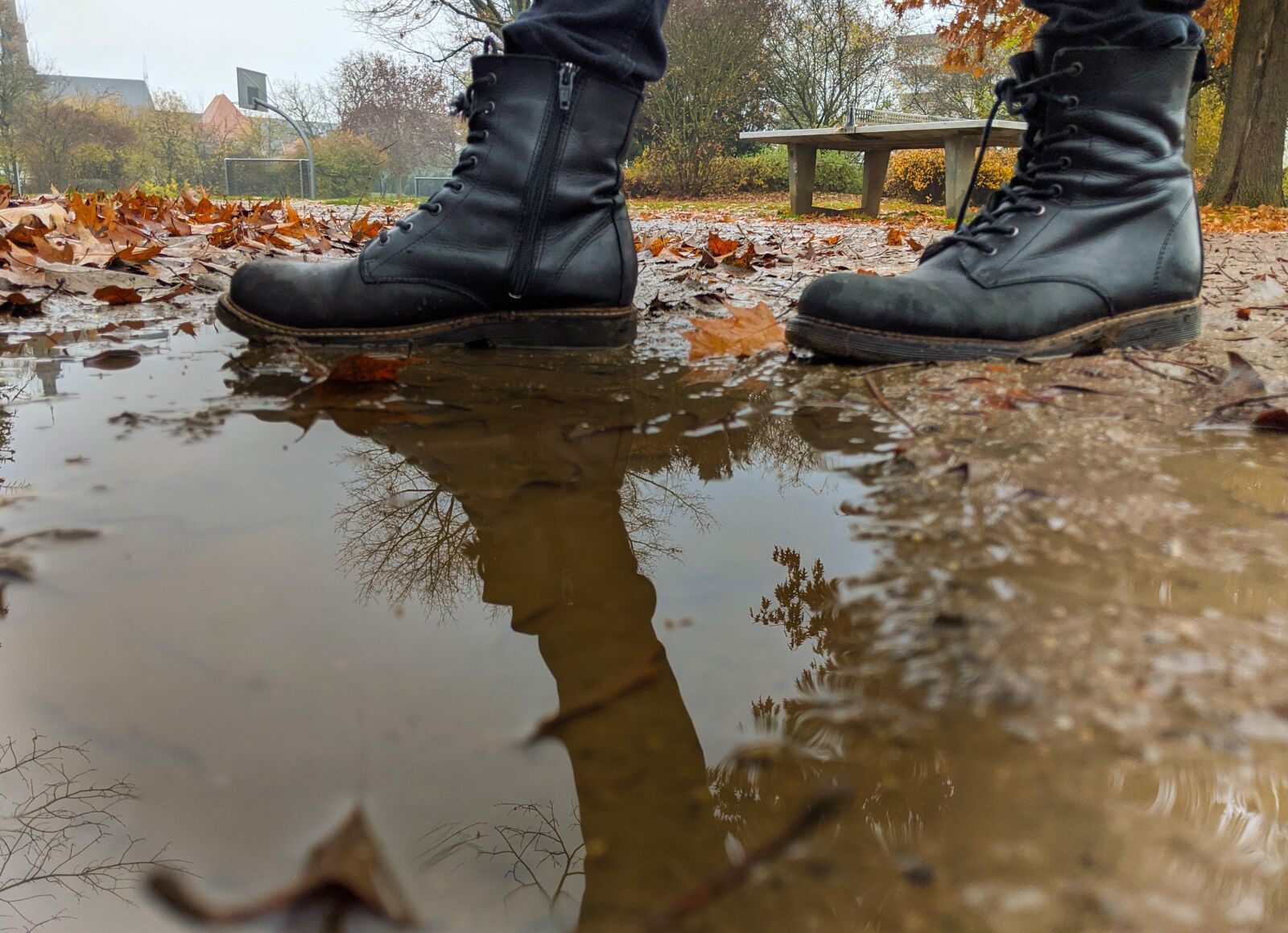 Google Pixel 2 XL sample photo. Shoes, reflect, puddle photography