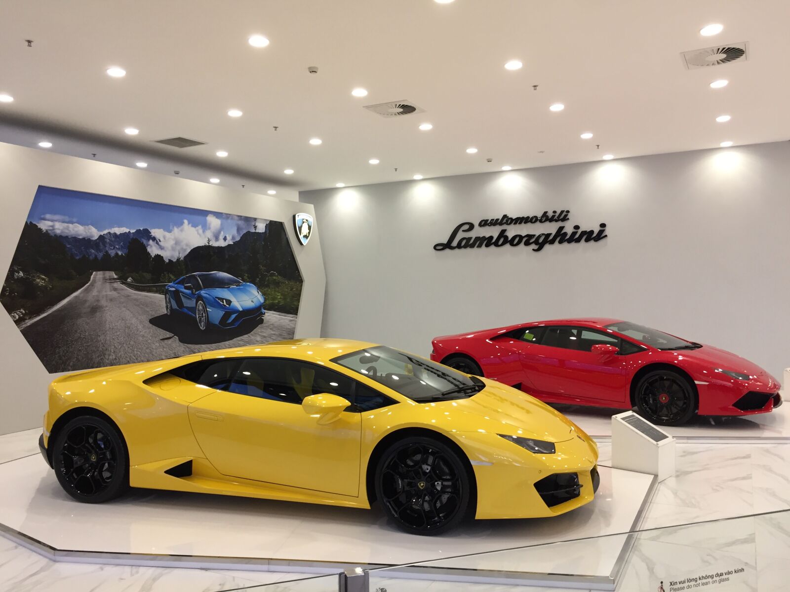 iPhone 6 back camera 4.15mm f/2.2 sample photo. Sports car, exhibition, luxury photography