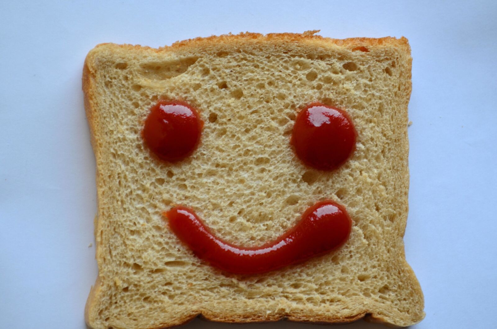 Nikon D5100 sample photo. Bread, slice, smile, emotion photography