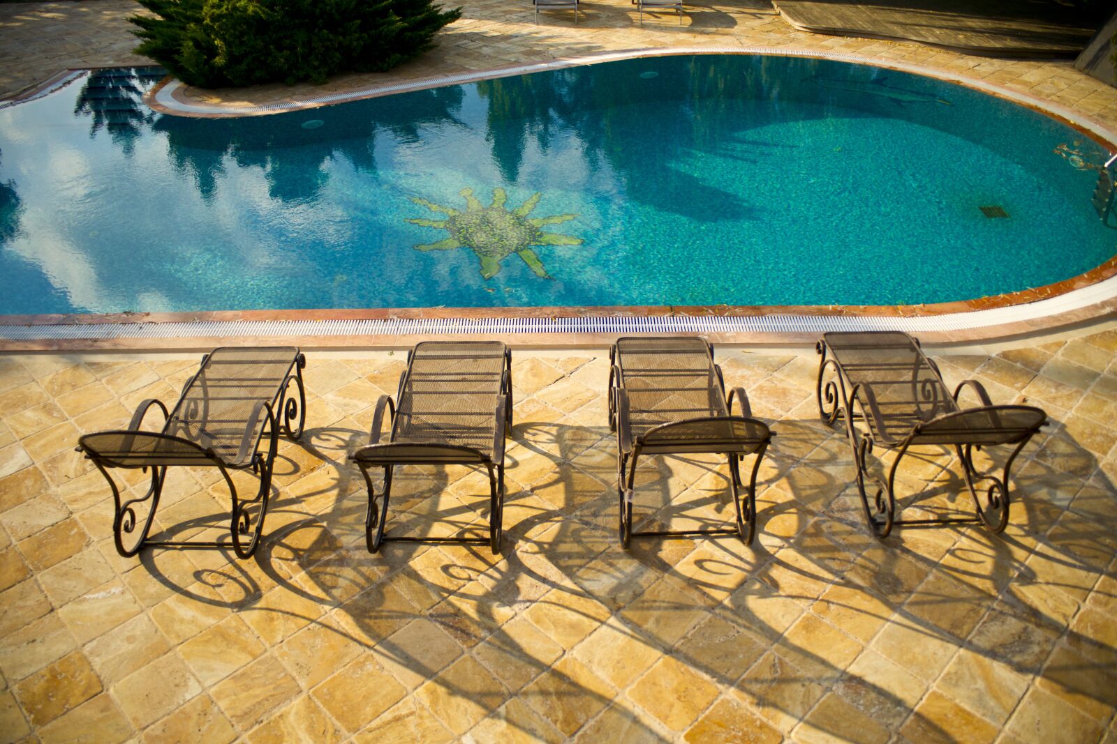 Sony Alpha DSLR-A850 sample photo. Sunbeds, pool, water photography