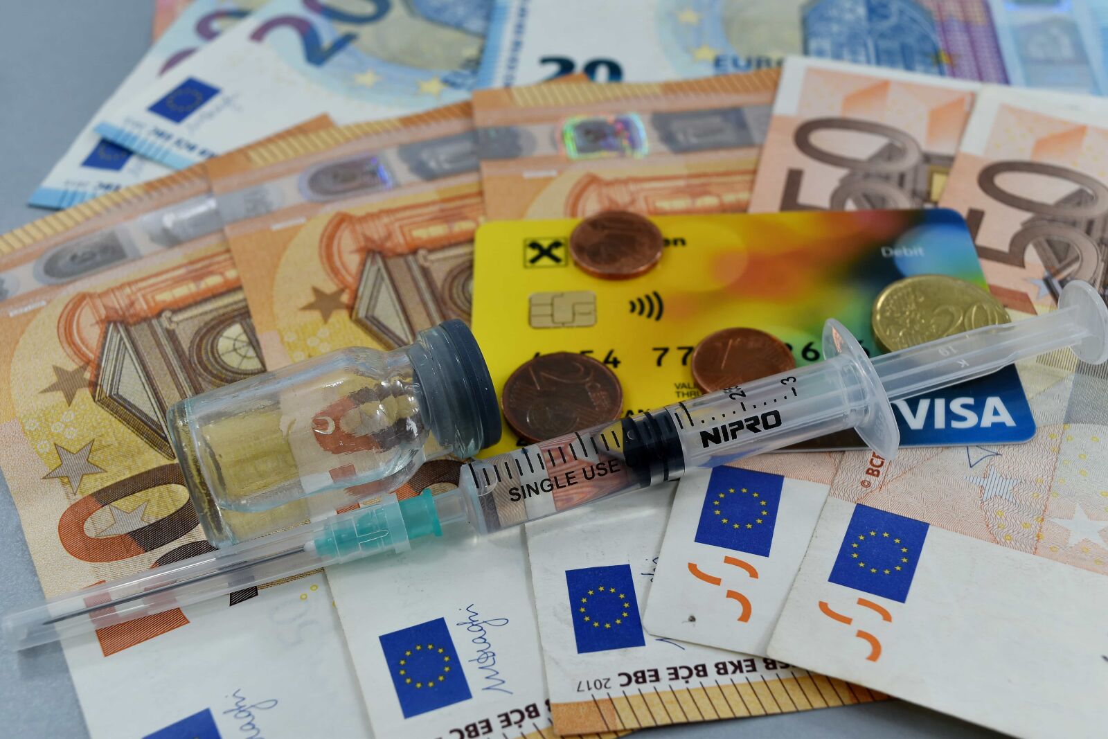 Nikon D5500 sample photo. Coins, cure, disease, economic photography