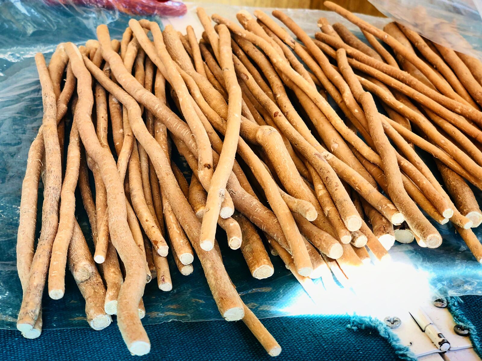 iPhone X back dual camera 6mm f/2.4 sample photo. Miswak, brush teeth, typh photography
