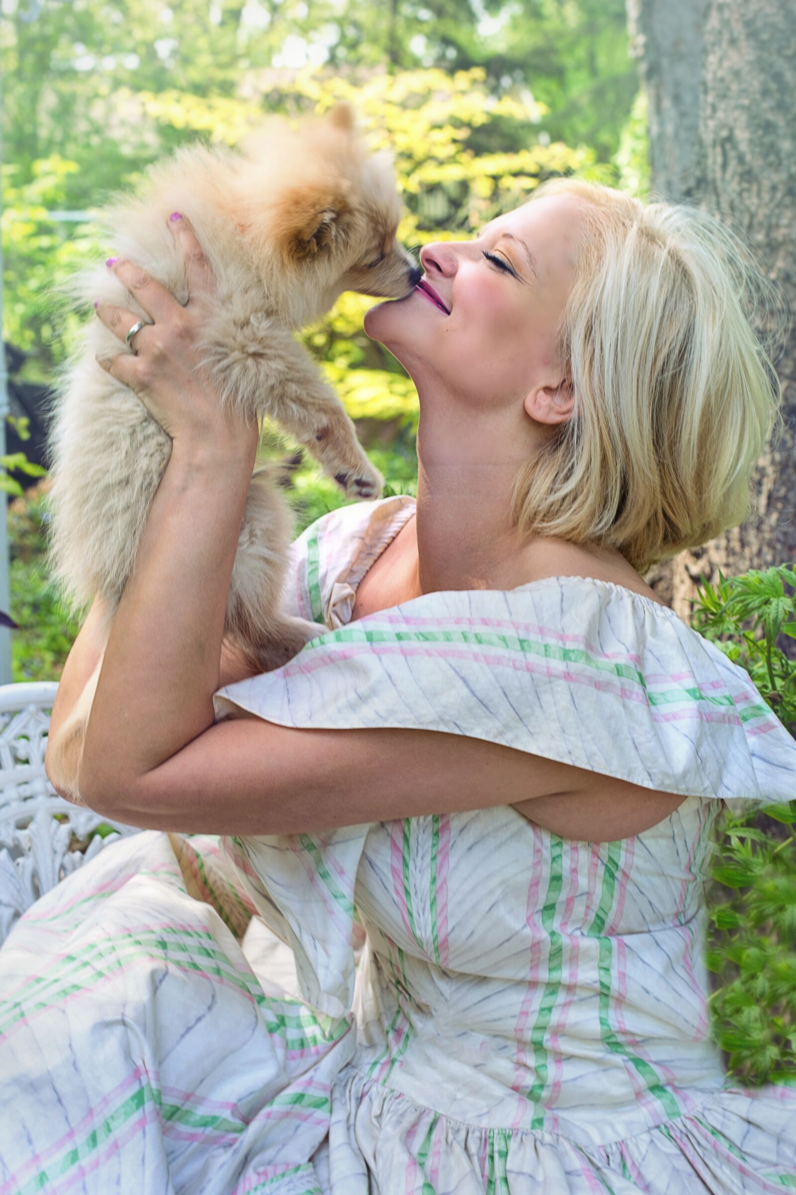 Canon EF 50mm F1.4 USM sample photo. Woman, puppy, happy photography