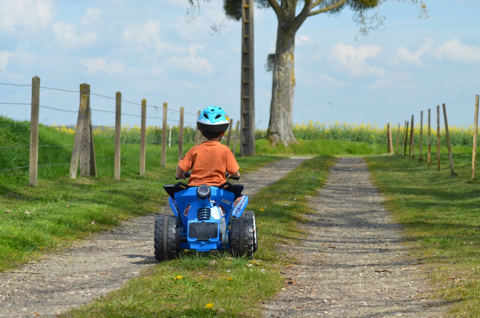 Nikon D5100 sample photo. Child, quad, outdoor games photography
