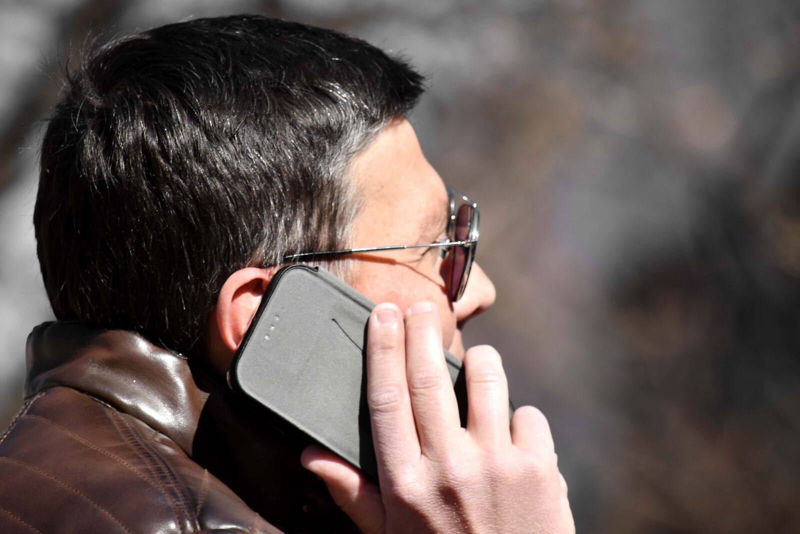Nikon D5500 sample photo. Businessman, businessperson, ear, hand photography