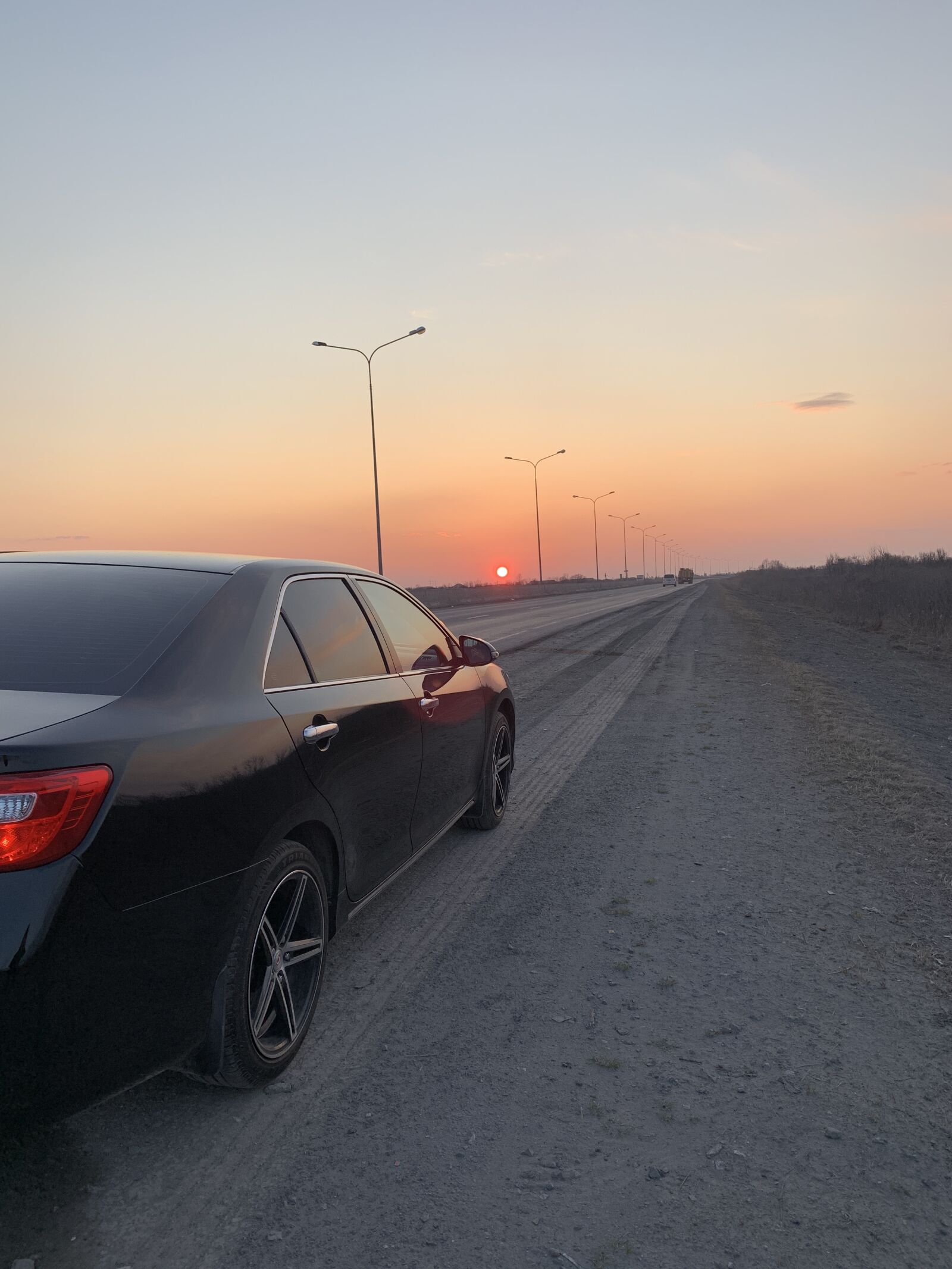 Apple iPhone XR sample photo. Tyumen, sunset, machine photography