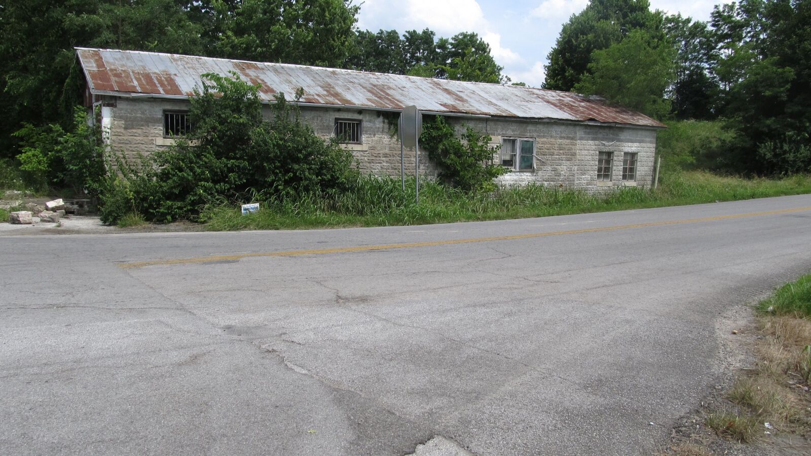 Canon PowerShot SX130 IS sample photo. Abandoned, store, country road photography