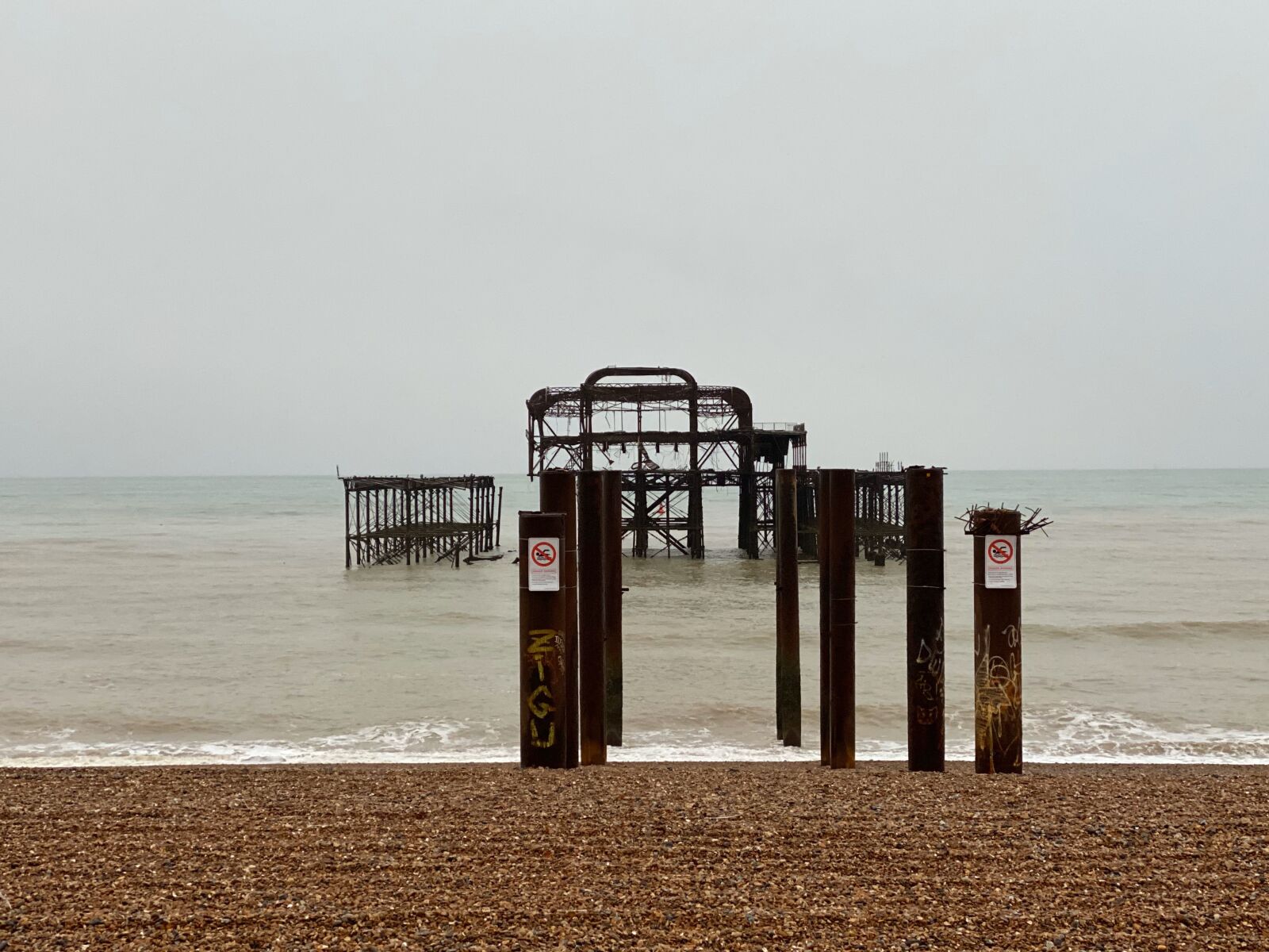 Apple iPhone 11 Pro Max + iPhone 11 Pro Max back triple camera 6mm f/2 sample photo. Brighton, pier, old photography