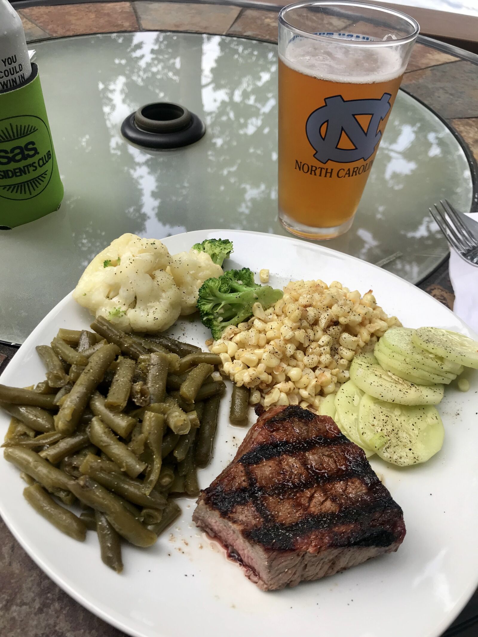 iPhone 7 back camera 3.99mm f/1.8 sample photo. Dinner, steak, al fresco photography