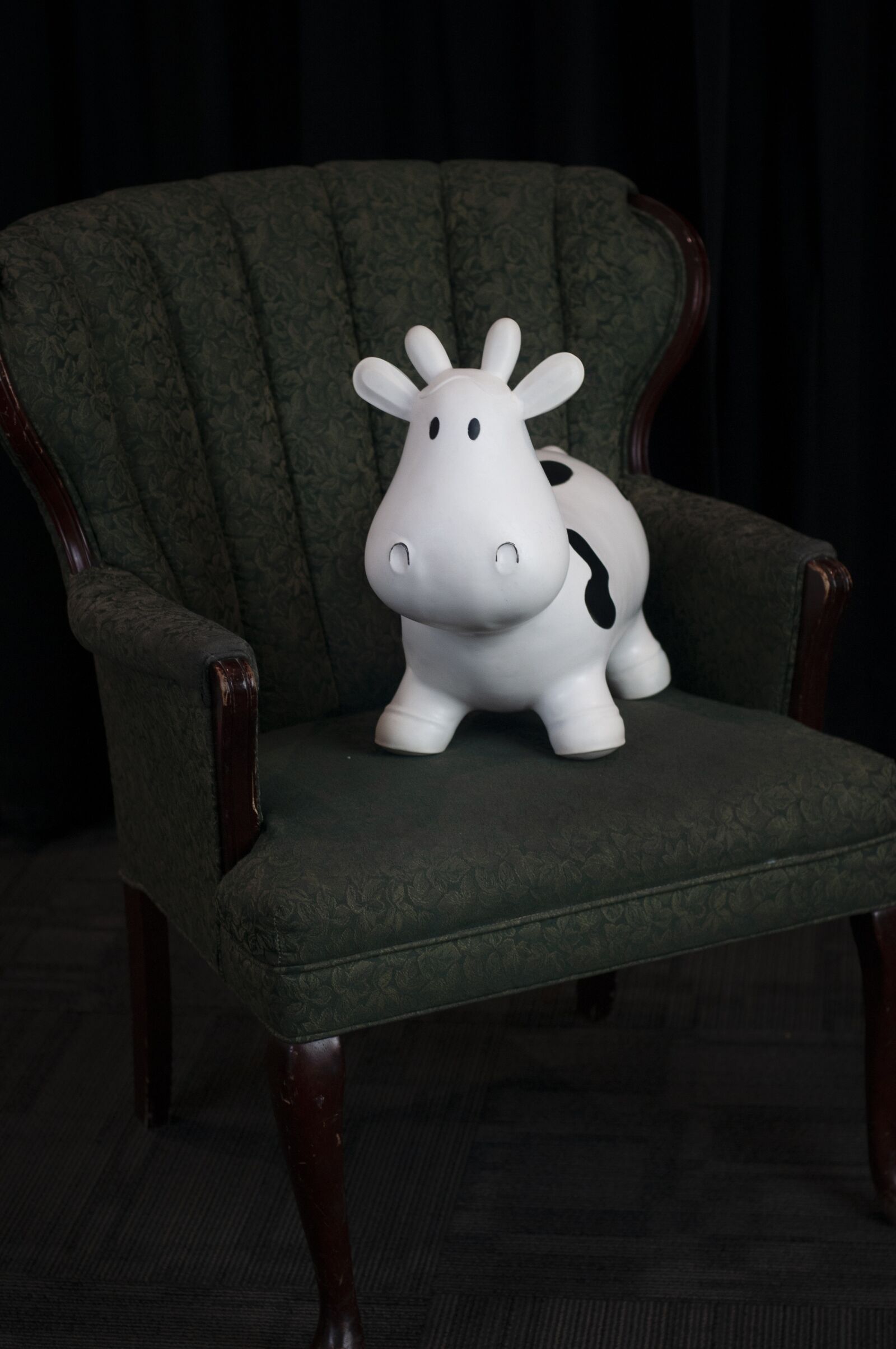 Nikon D300S sample photo. Cow, rubber cow, chair photography