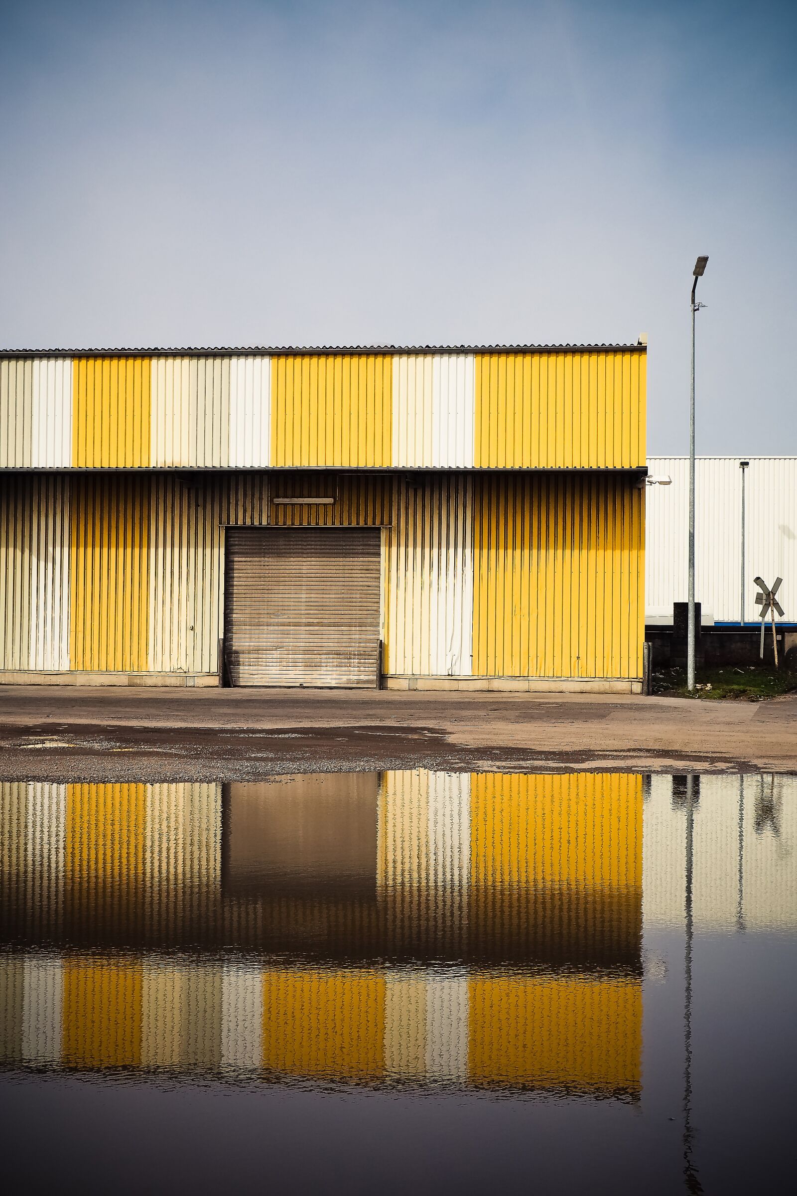 Olympus OM-D E-M10 sample photo. Warehouse, port, stock photography