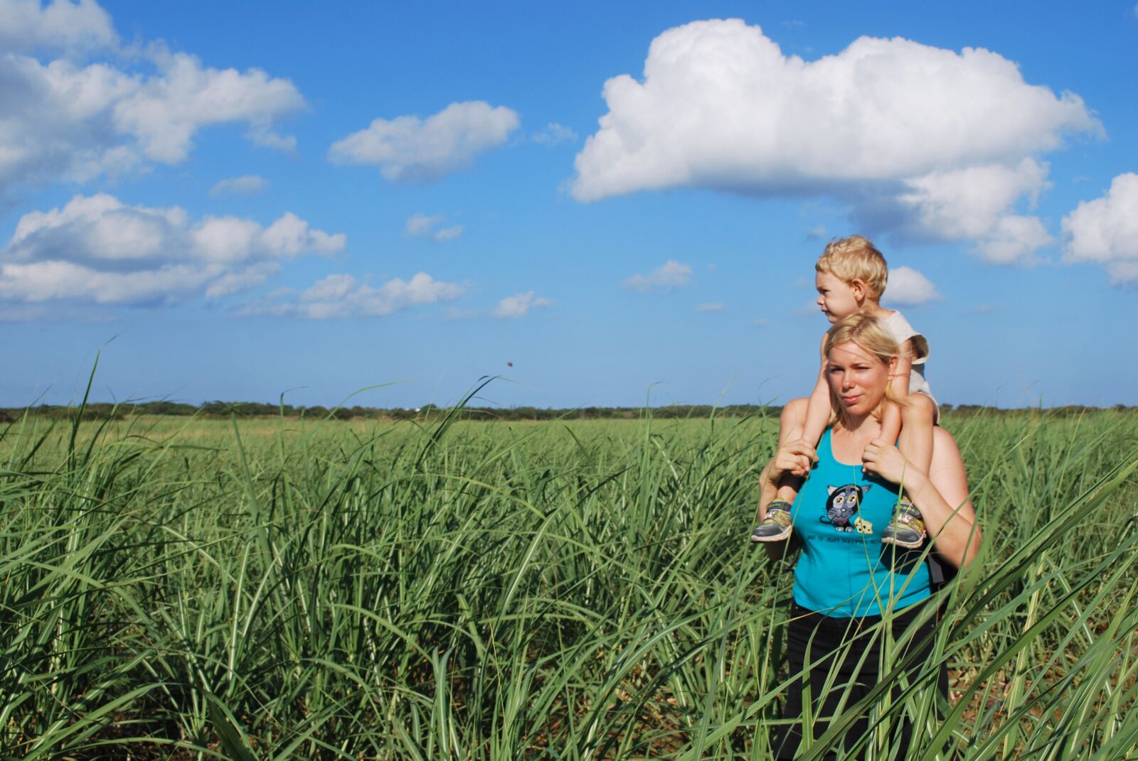 Nikon D60 sample photo. Mother, son, sugar cane photography