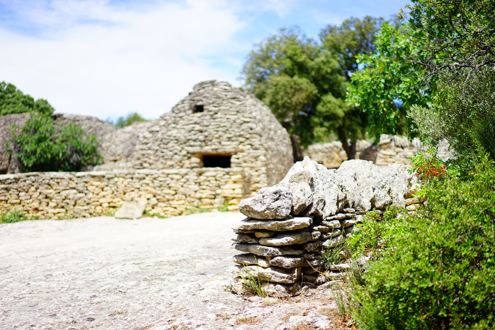 Sony a7 + Sony Sonnar T* FE 55mm F1.8 ZA sample photo. Beehive hut, bories, mounting photography