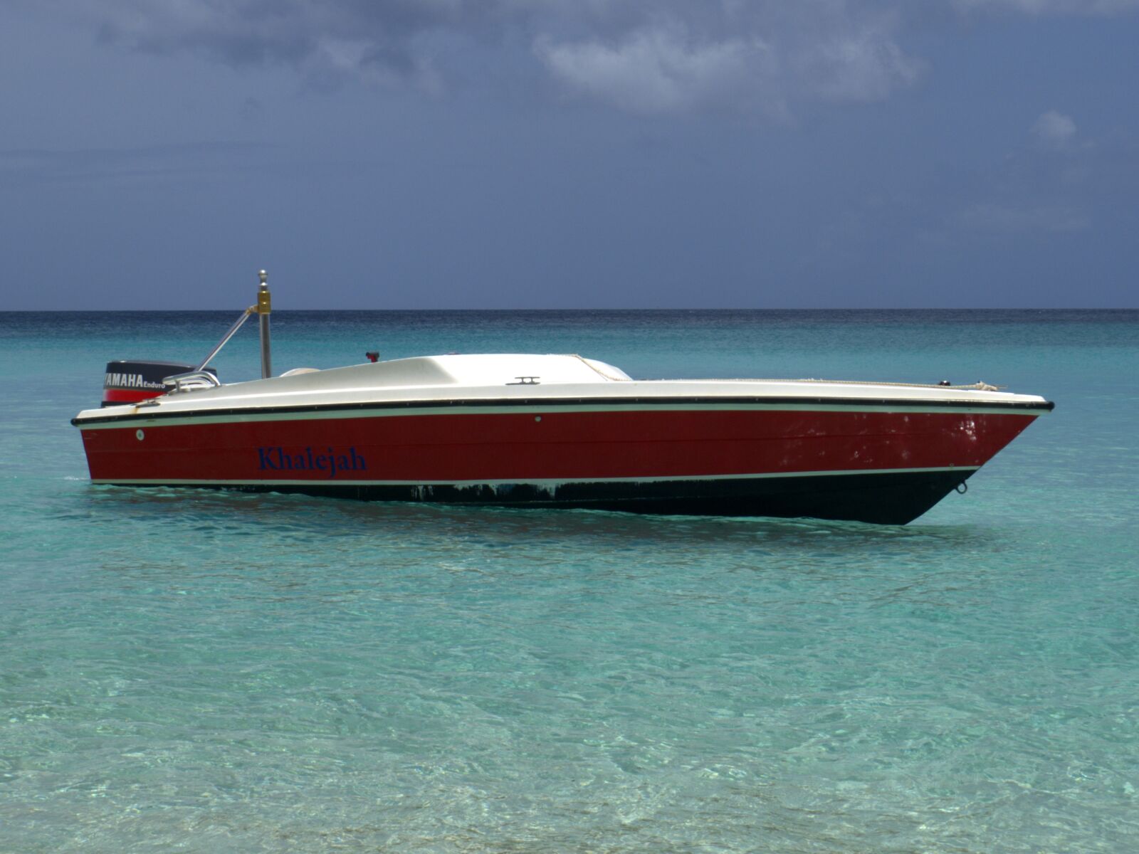 Pentax Q10 sample photo. Boat, water, beach photography