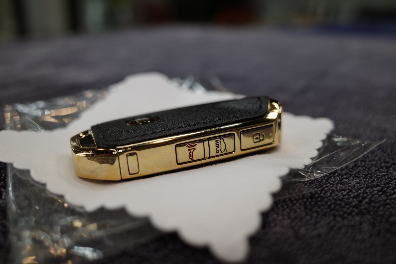 Ricoh GR III sample photo. Car, key, gold photography