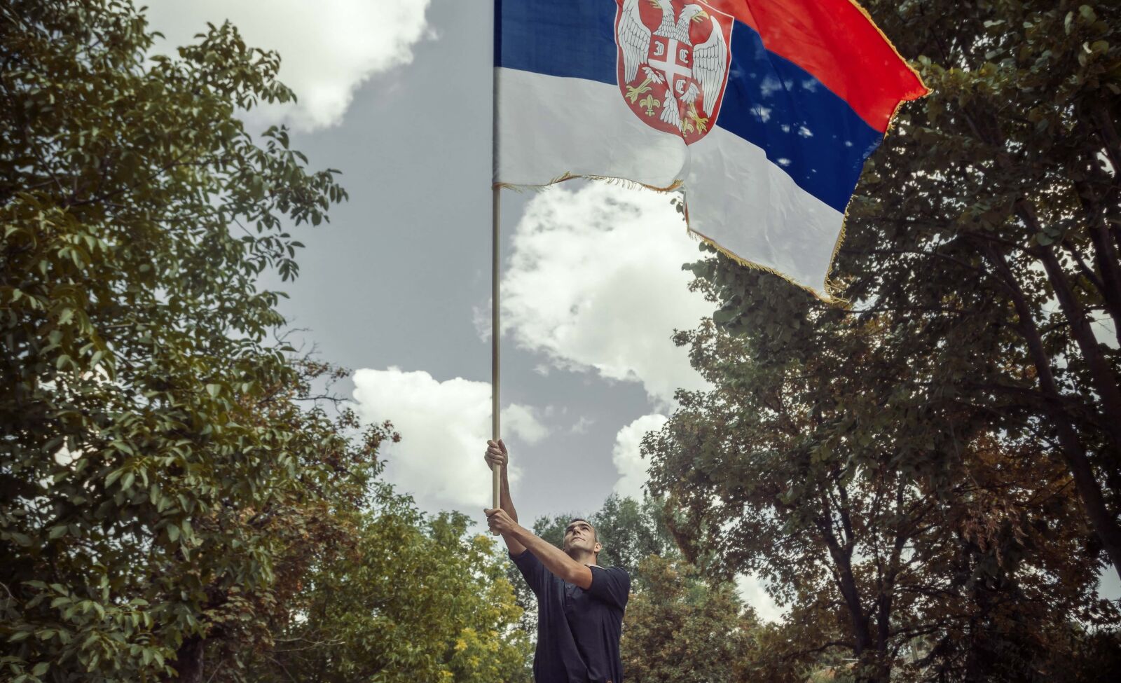 Canon EOS 6D + Canon EF 24-105mm F4L IS USM sample photo. Flag, standing, serbia, man photography
