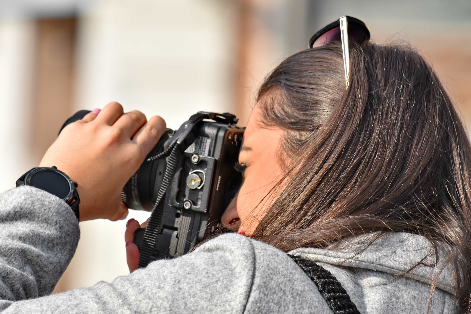 Nikon D5500 sample photo. Arm, camera, finger, hairstyle photography