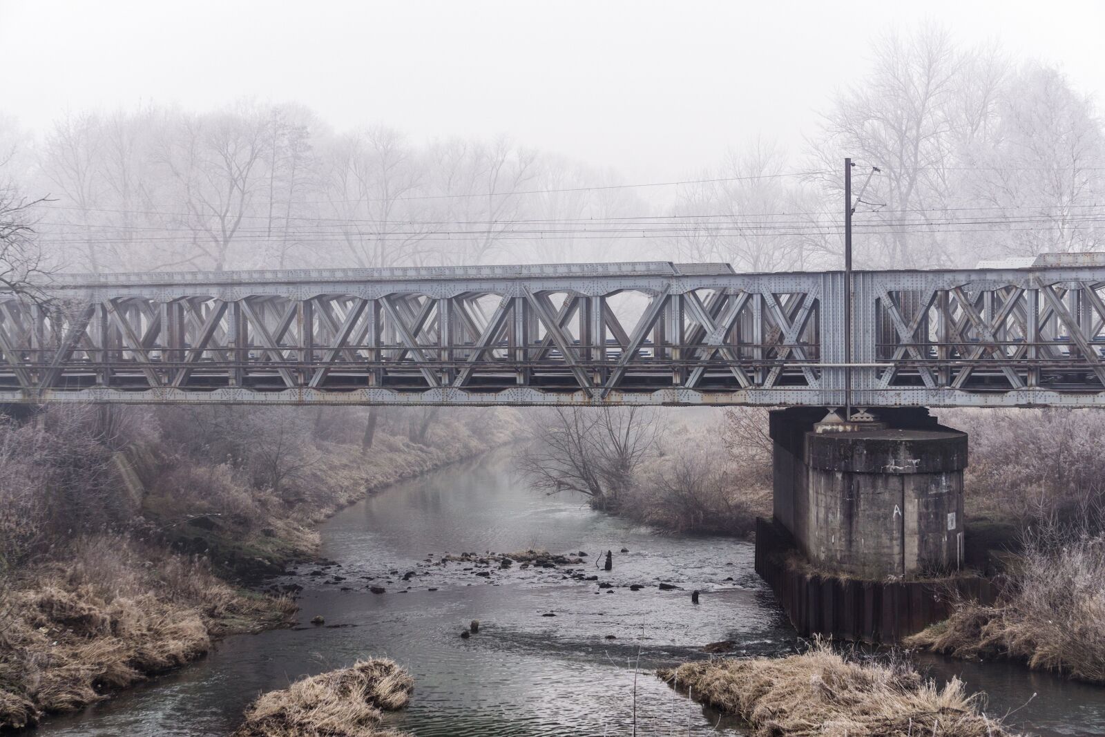 Sony E 55-210mm F4.5-6.3 OSS sample photo. Bridge, river, railway photography