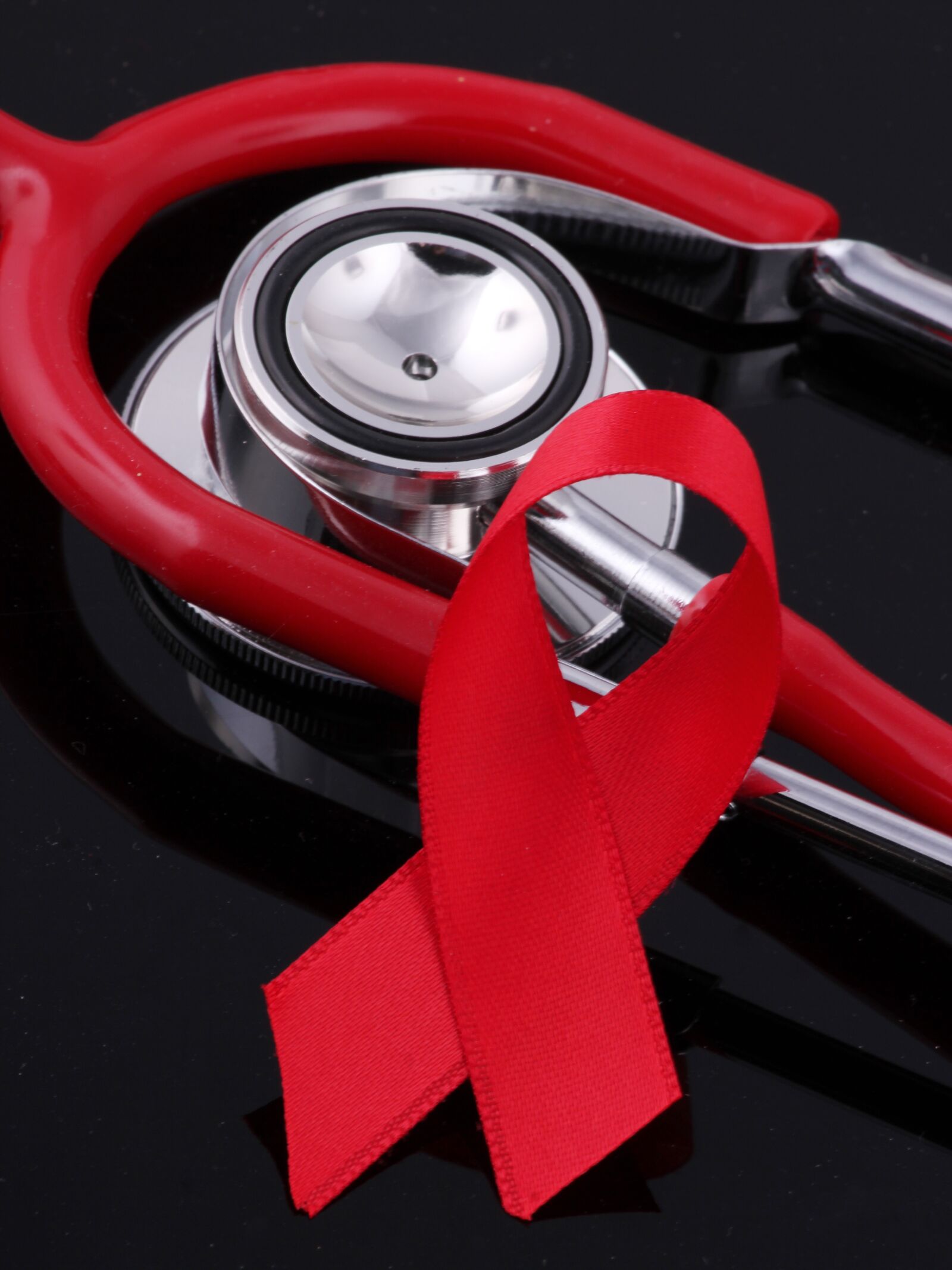 Canon EOS 550D (EOS Rebel T2i / EOS Kiss X4) sample photo. Stethoscope, red, hiv photography