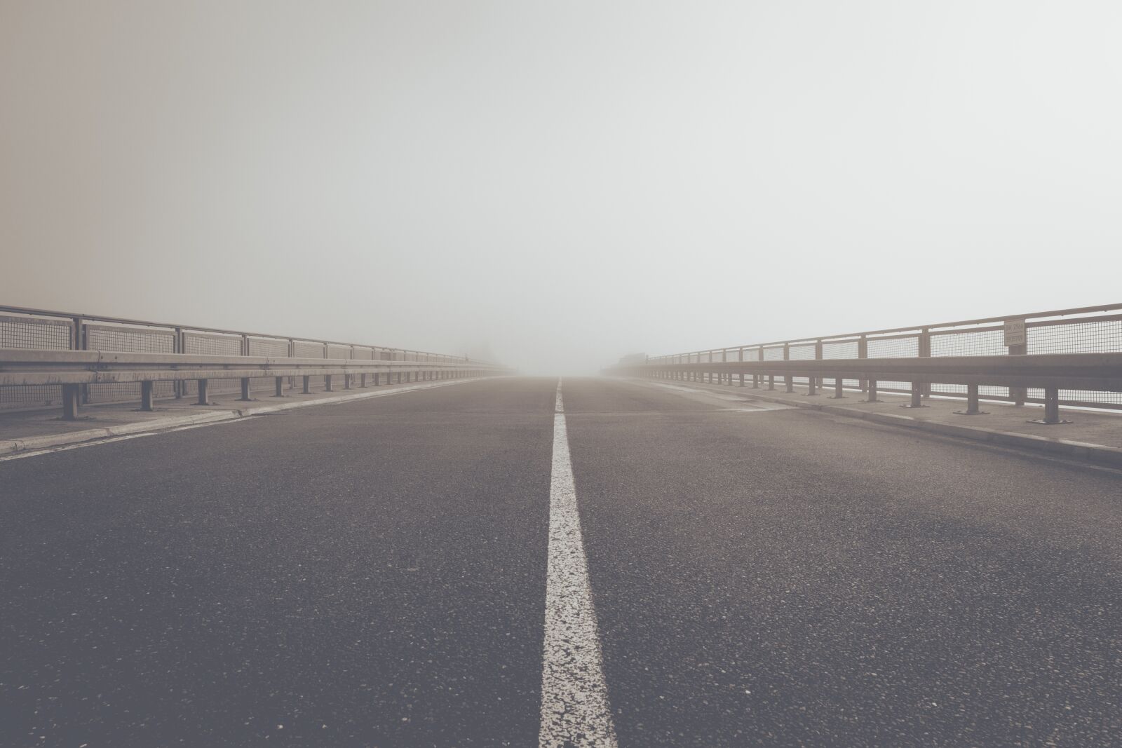 Canon EF 24-70mm F2.8L II USM sample photo. Fog, road, highway photography