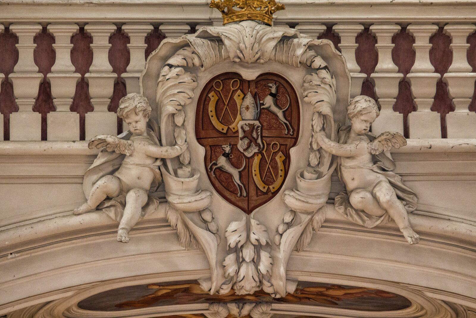 Canon EF-S 55-250mm F4-5.6 IS STM sample photo. Cherub, pillar, coat of photography