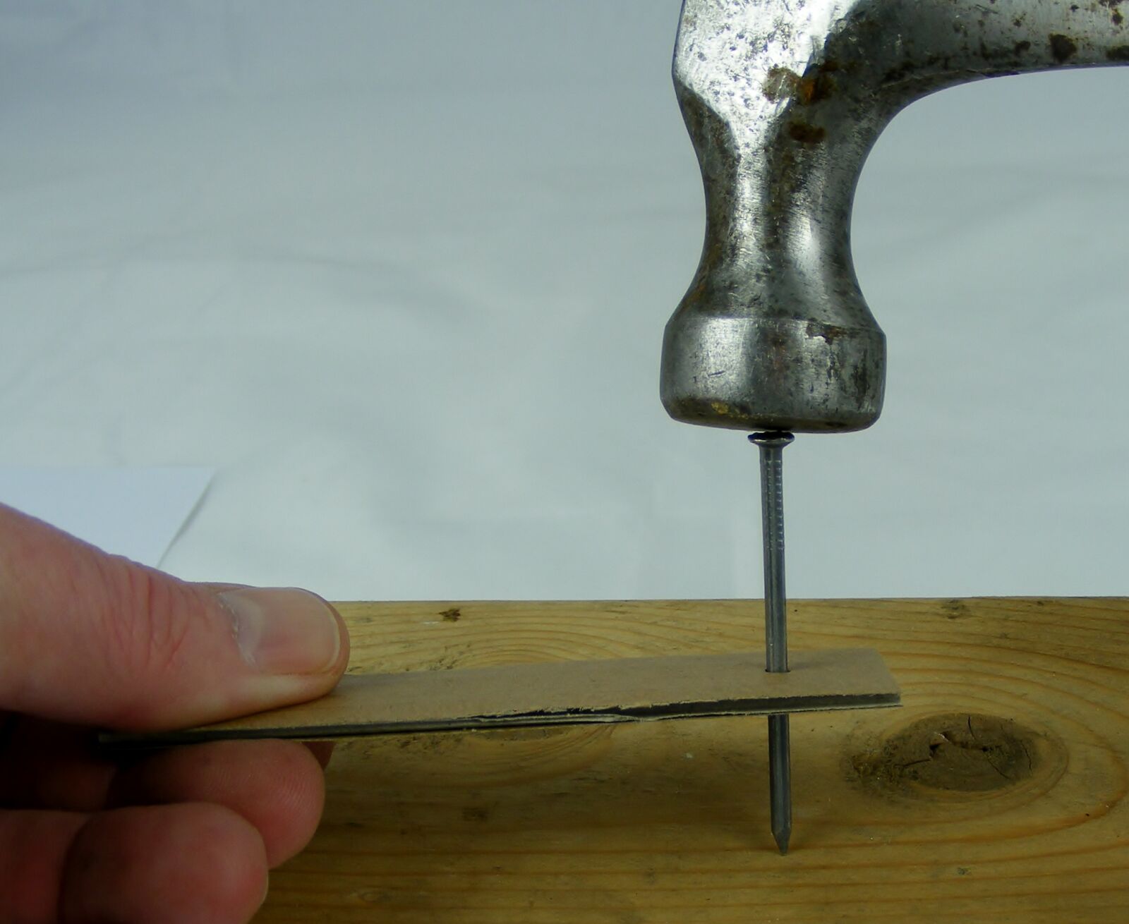 Fujifilm FinePix S5700 S700 sample photo. Hammer, nail, construction photography