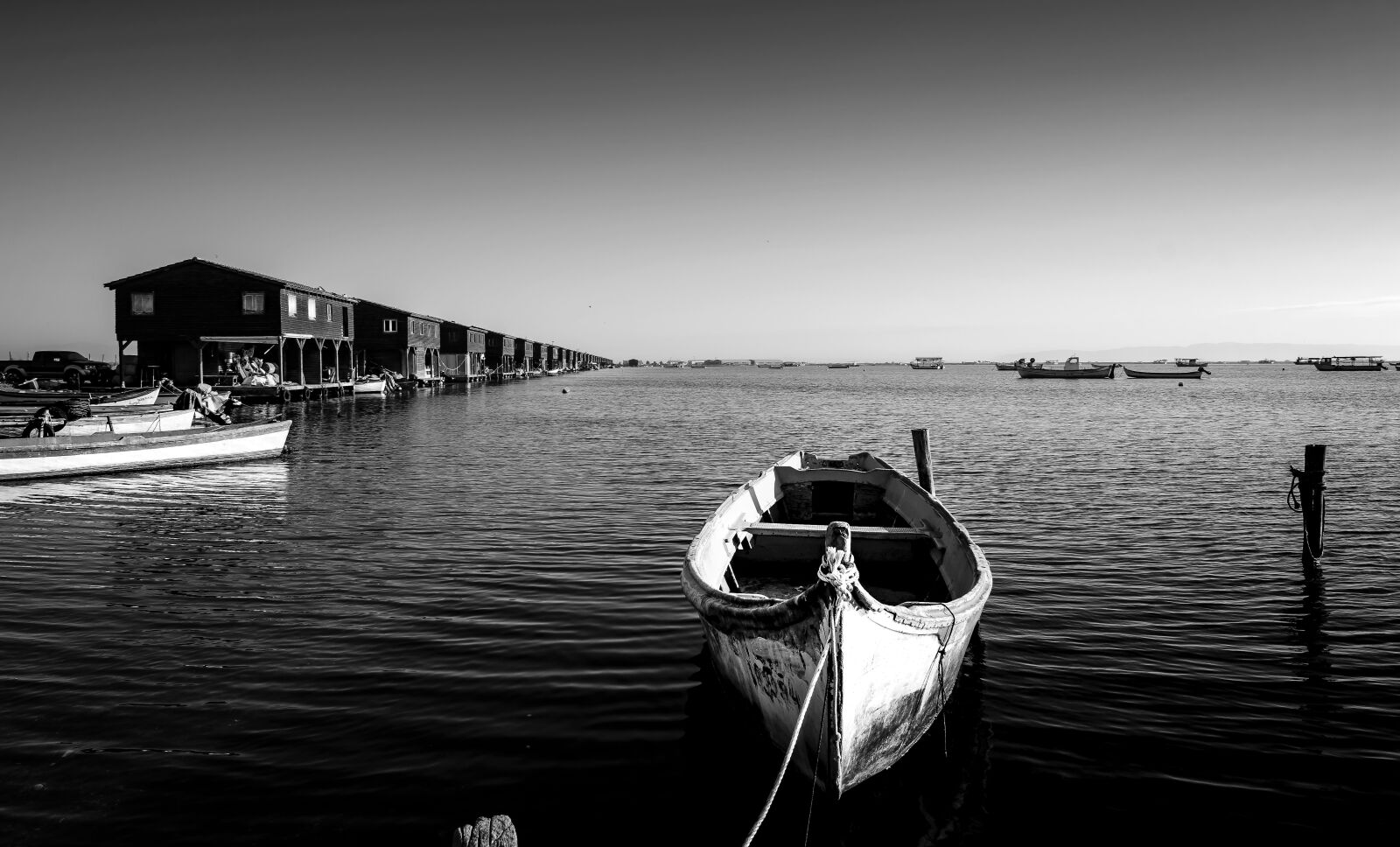 Nikon D5300 + Tokina AT-X Pro 11-16mm F2.8 DX II sample photo. Boats, huts, landscape photography