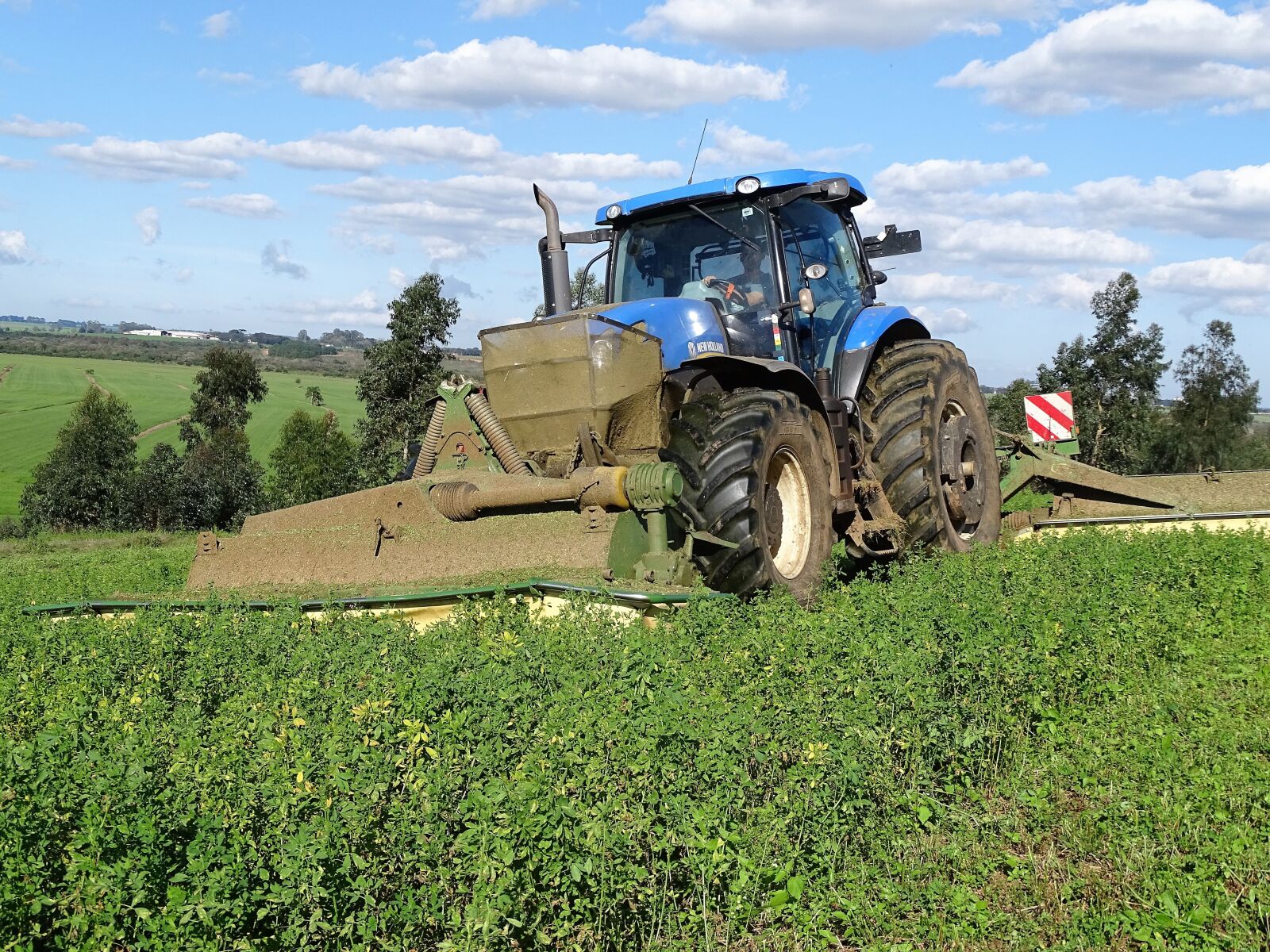 Sony Cyber-shot DSC-HX400V sample photo. Tractor, plantation, clouds photography