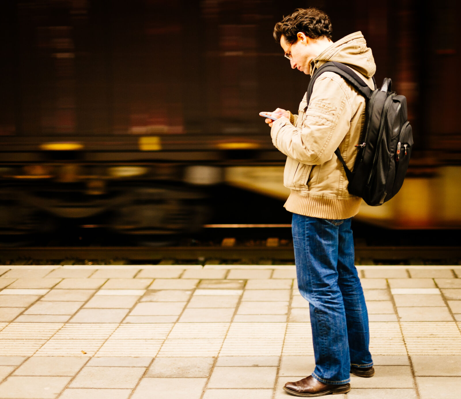 Fujifilm X-Pro1 sample photo. Guy, night, train photography
