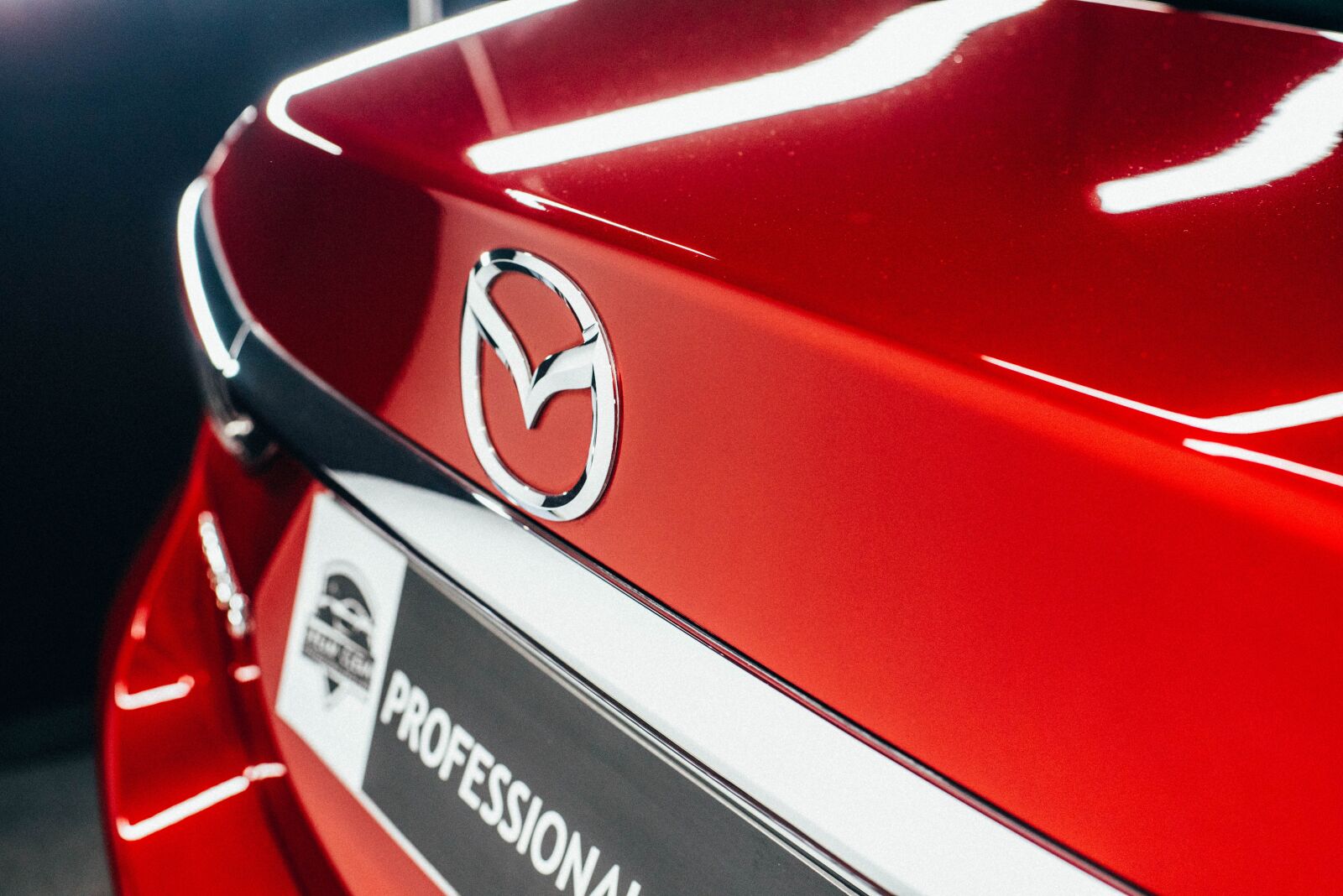 Nikon D750 sample photo. Mazda, logo, trunk photography