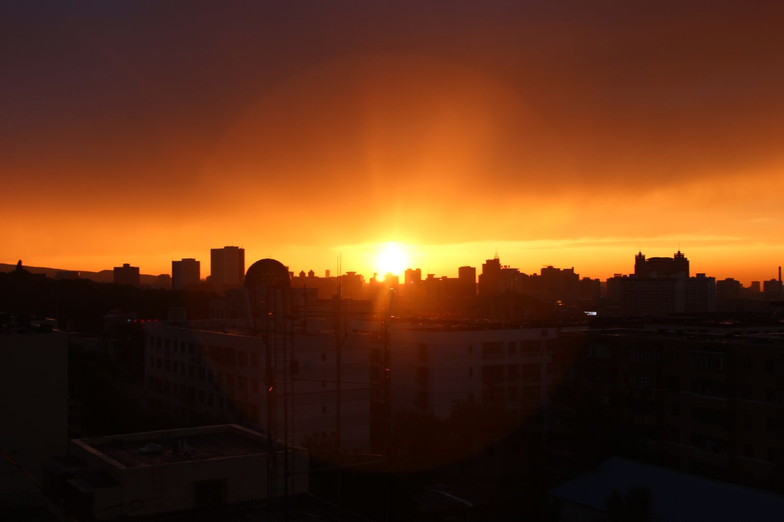 Canon EF-S 18-135mm F3.5-5.6 IS sample photo. Rain, urumqi, sunset photography