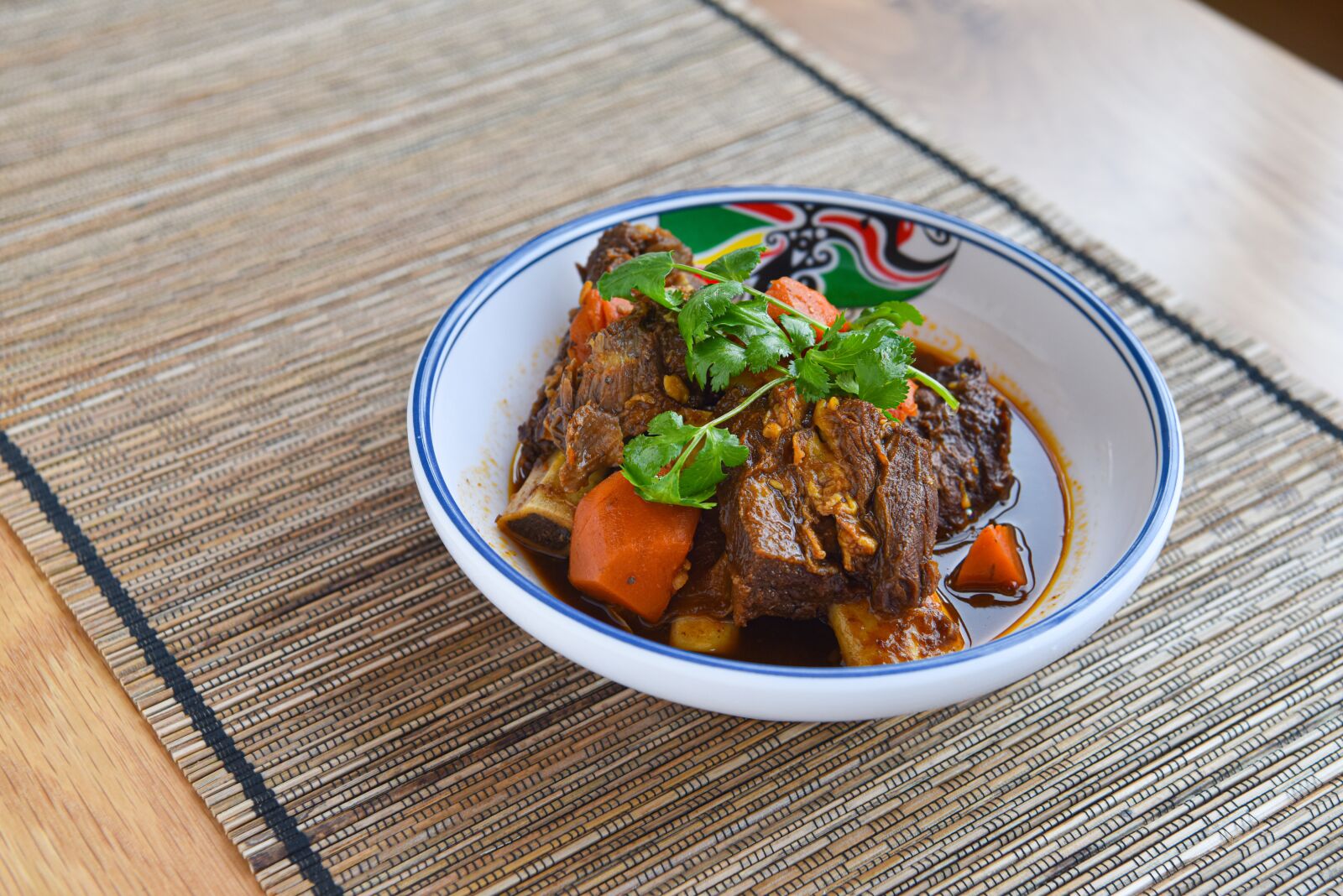 Nikon D810 sample photo. Braised, beef, herbs photography
