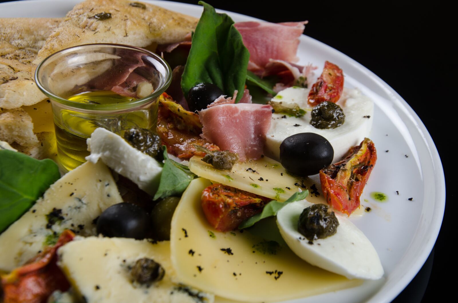 Nikon D7000 sample photo. Foccacia with olives, tasting photography
