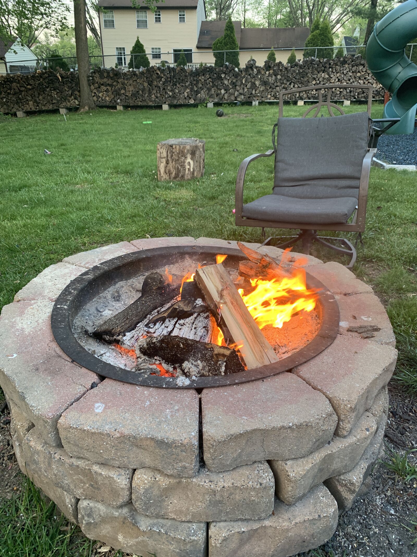 iPhone XR back camera 4.25mm f/1.8 sample photo. Fire pit, back yard photography