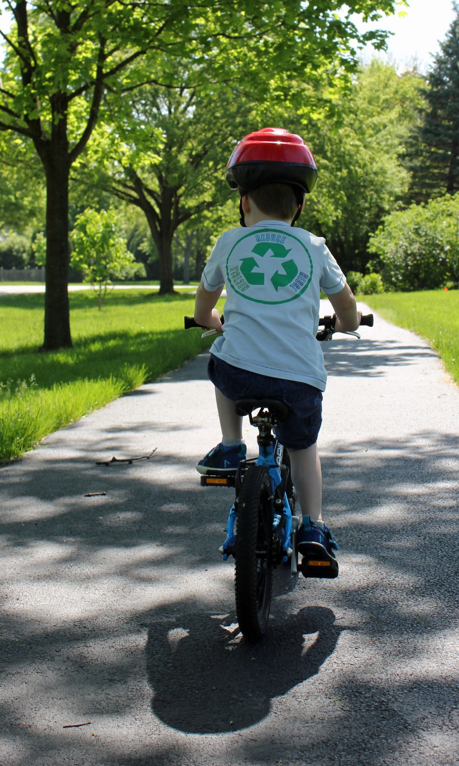 Canon EOS 550D (EOS Rebel T2i / EOS Kiss X4) sample photo. Cycling, child on bike photography