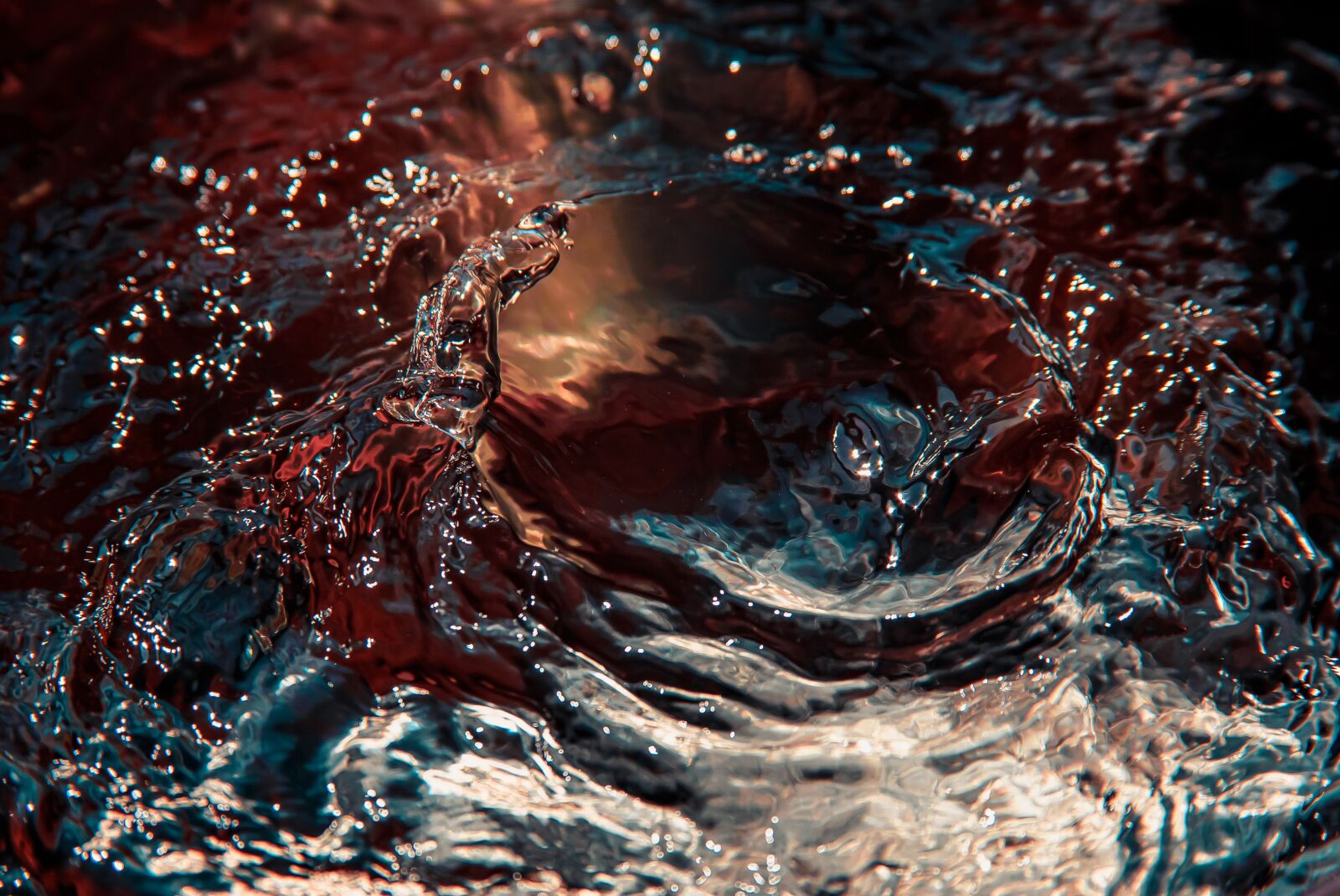 Canon EF 28-135mm F3.5-5.6 IS USM sample photo. Water, red, blue photography