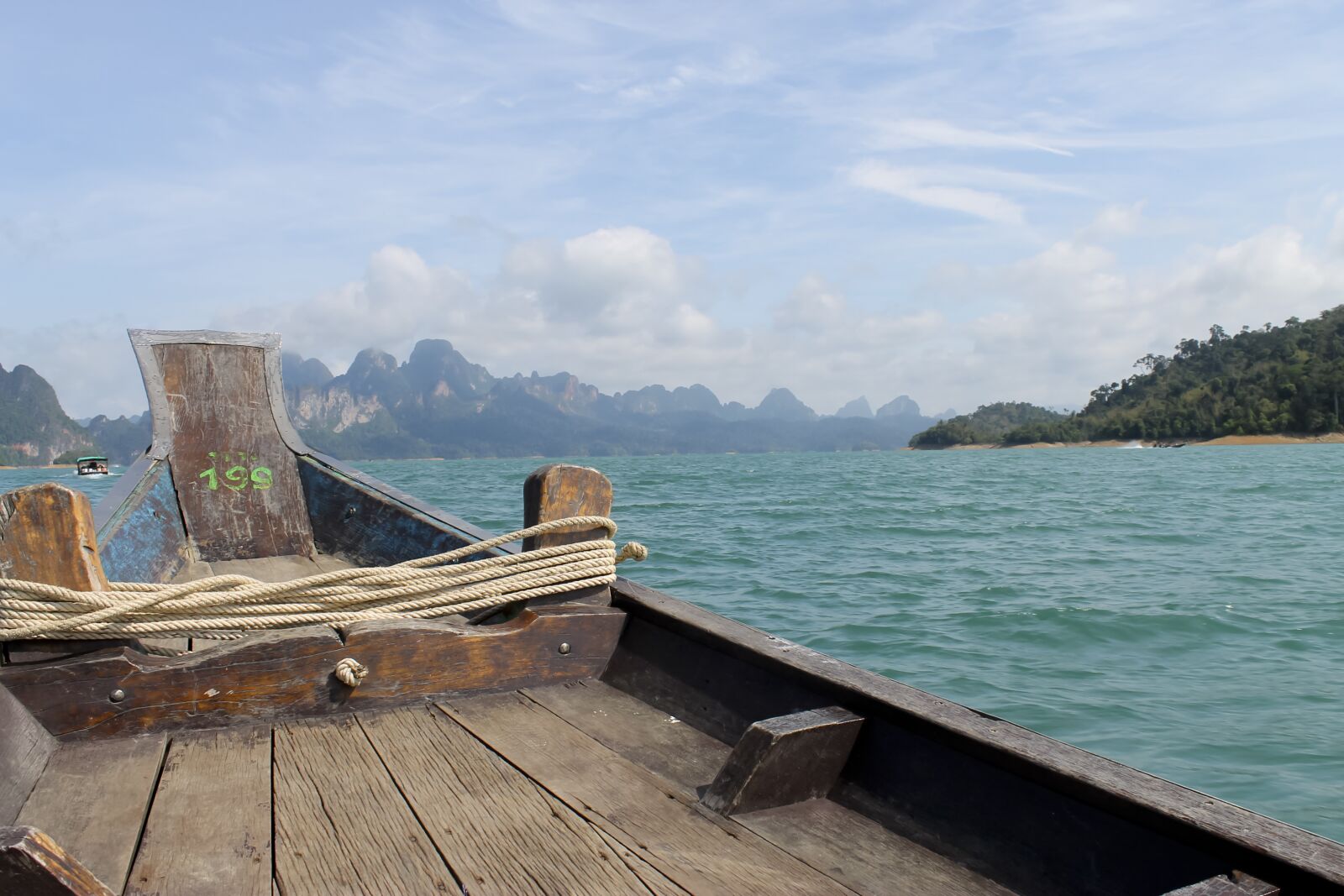 Canon EOS 1100D (EOS Rebel T3 / EOS Kiss X50) sample photo. Lake, rocks, boat photography