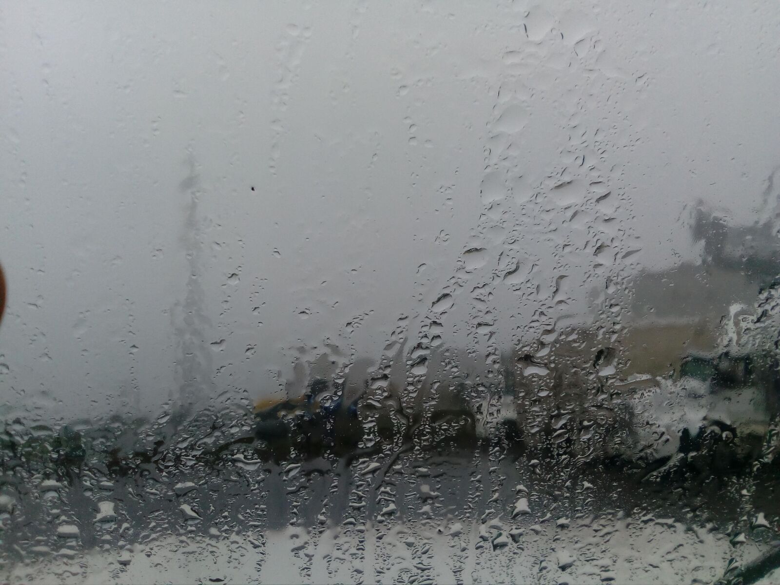 ZTE BLADE A510 sample photo. Rain, truck, weather photography