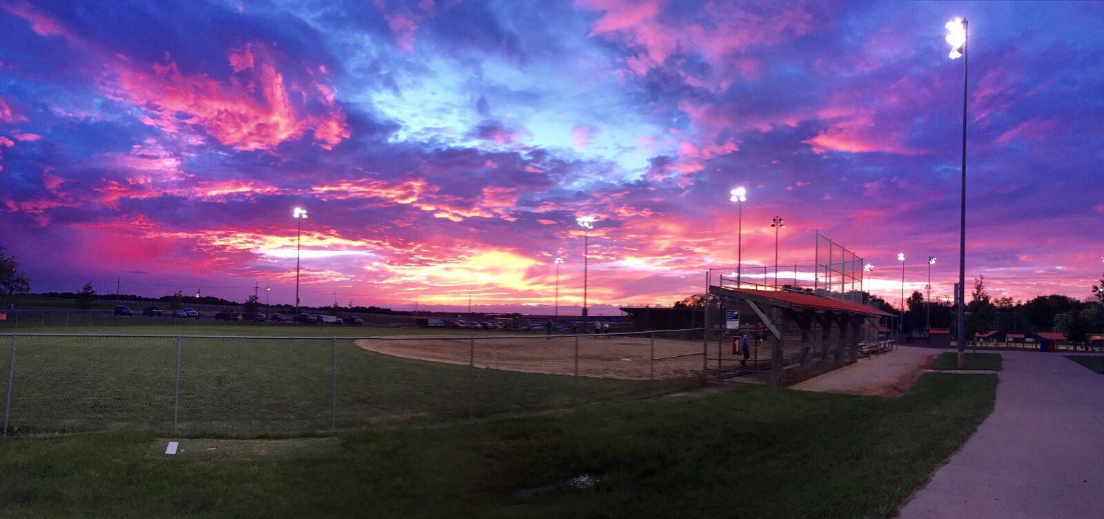 Apple iPhone 6s Plus sample photo. Sunset, over, baseball, field photography