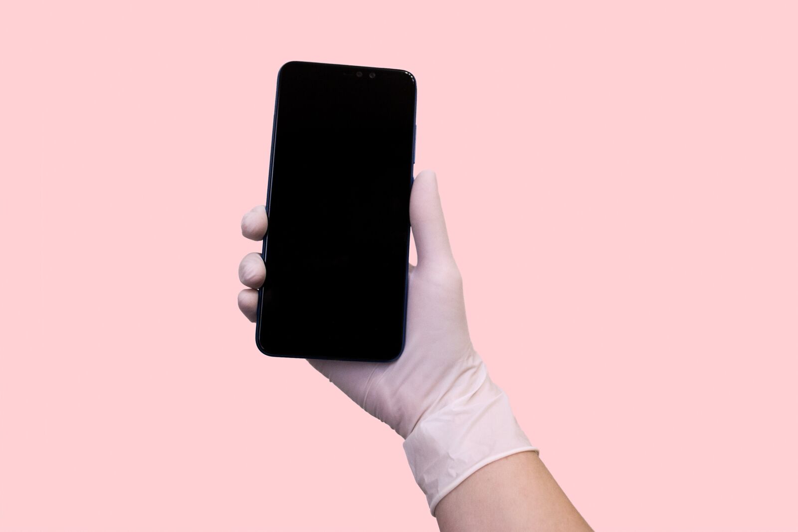 Nikon D3100 sample photo. Smartphone, hand, medicine photography