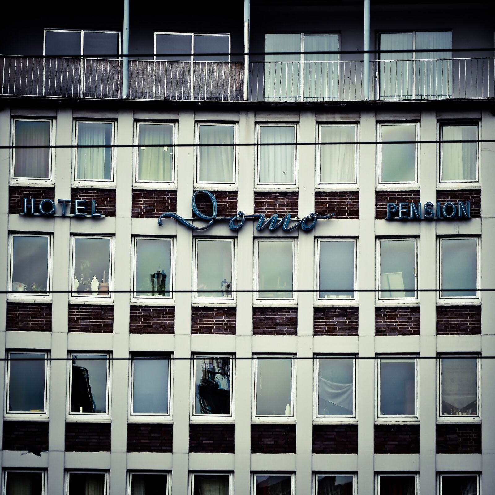 Olympus OM-D E-M10 sample photo. Architecture, hotel, facade photography