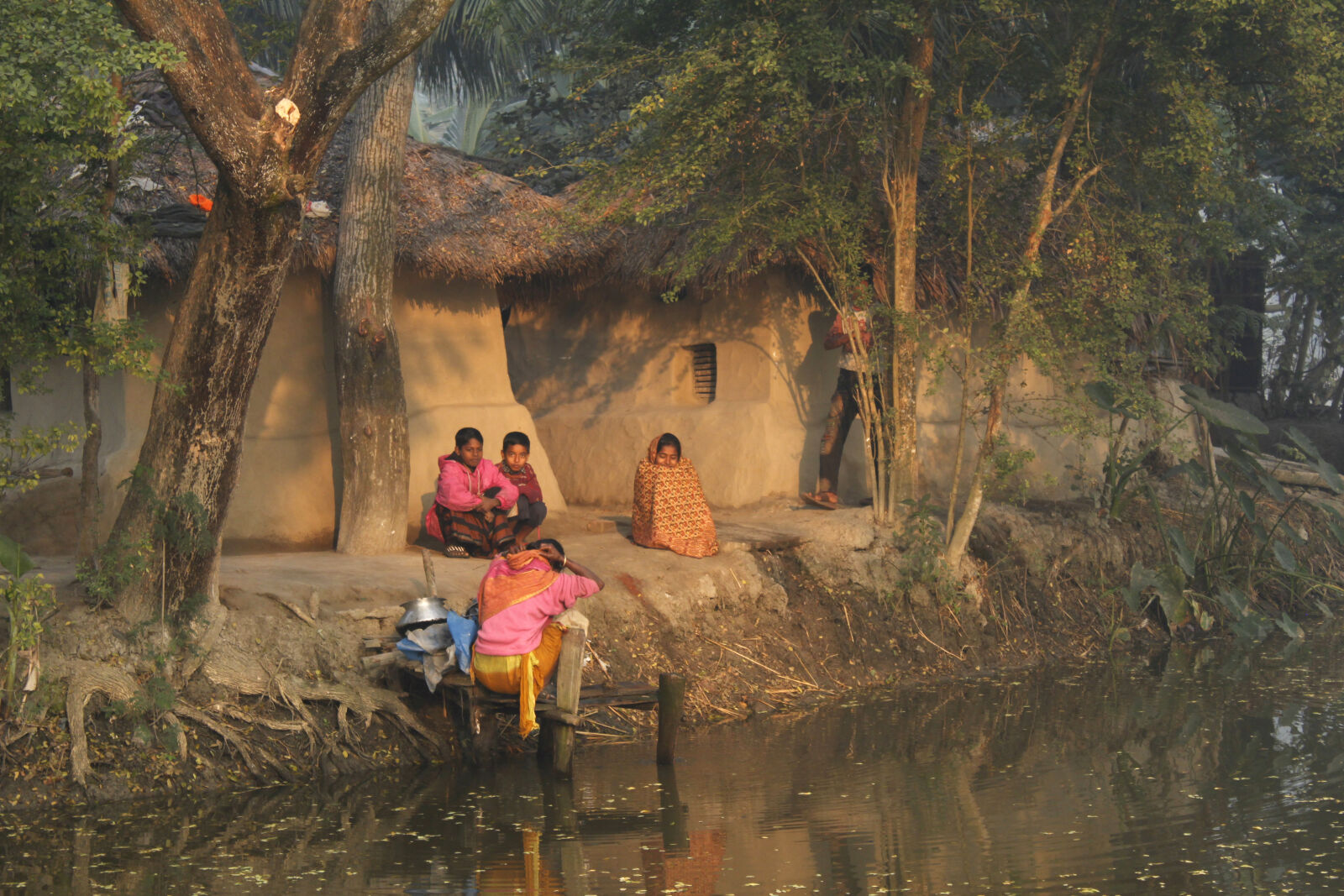Canon EOS 500D (EOS Rebel T1i / EOS Kiss X3) sample photo. Bangladesh, canal, fisherman, flower photography