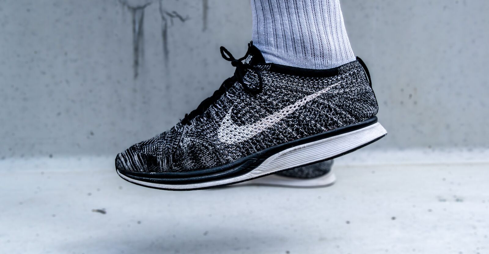 Canon EF-S 17-85mm F4-5.6 IS USM sample photo. Fashion, flyknit racer, foot photography