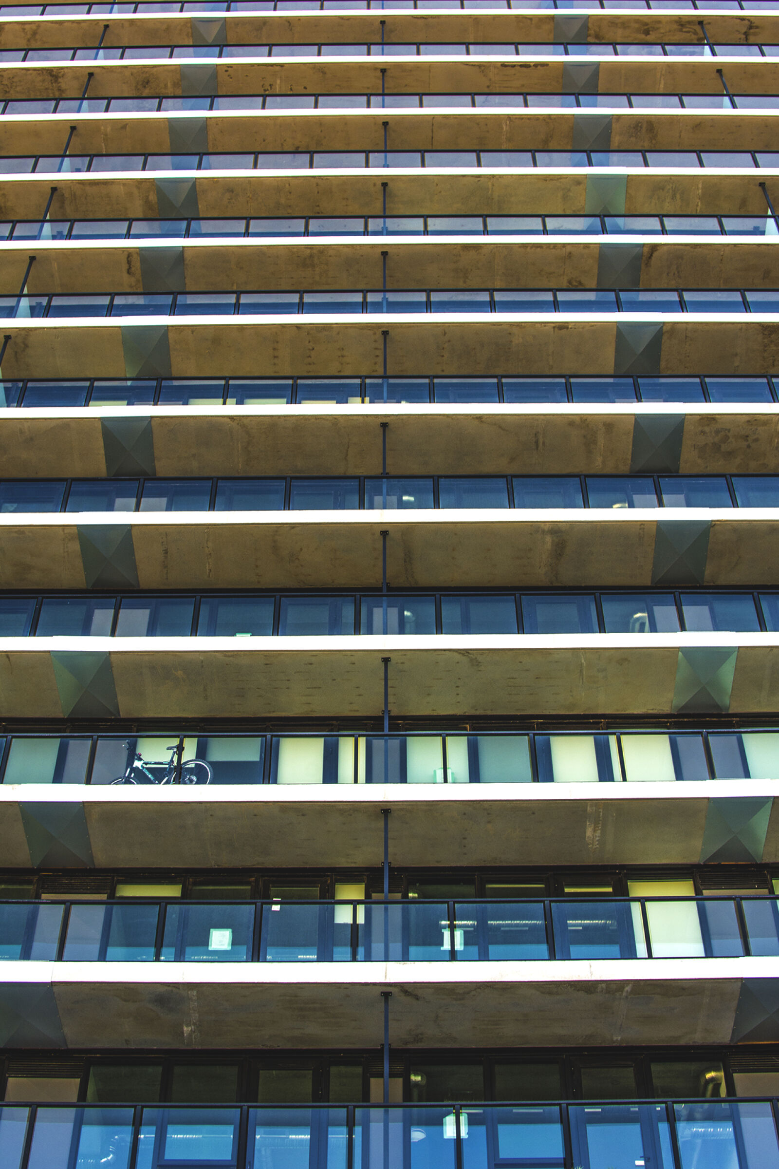 Nikon AF-S DX Nikkor 35mm F1.8G sample photo. Apartment, building, architecture, bicycle photography